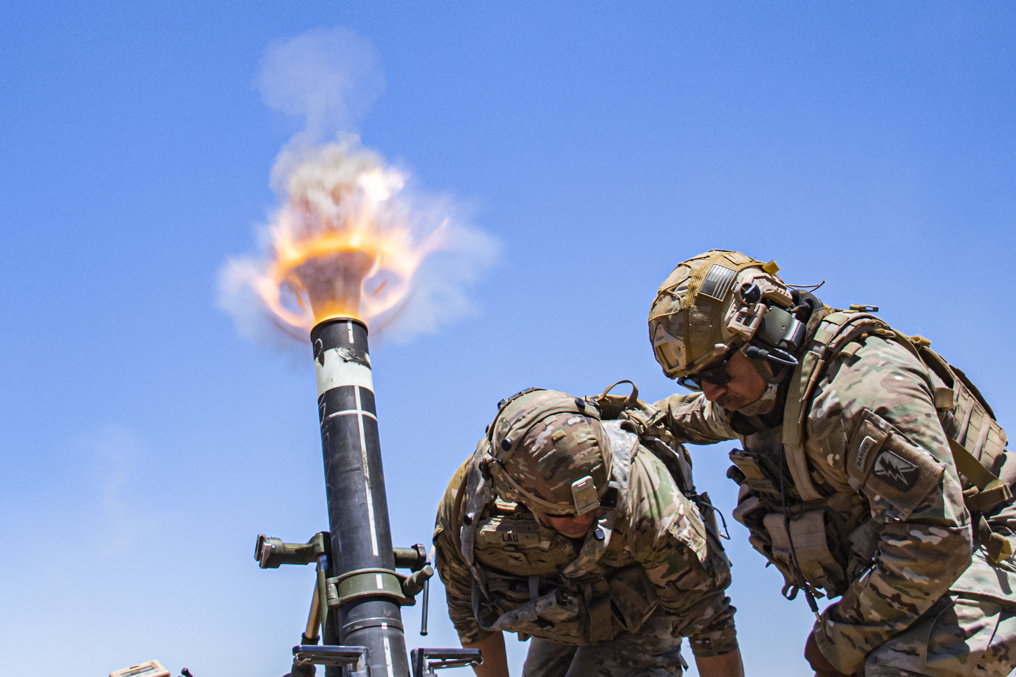 Col. Randy Lau, brigade commander of the 79th Infantry Brigade Combat Team, California National Guard, fires a 120mm mortar during a live-fire exercise at Camp Roberts, Calif. (Staff Sgt. Walter H. Lowell/Army)