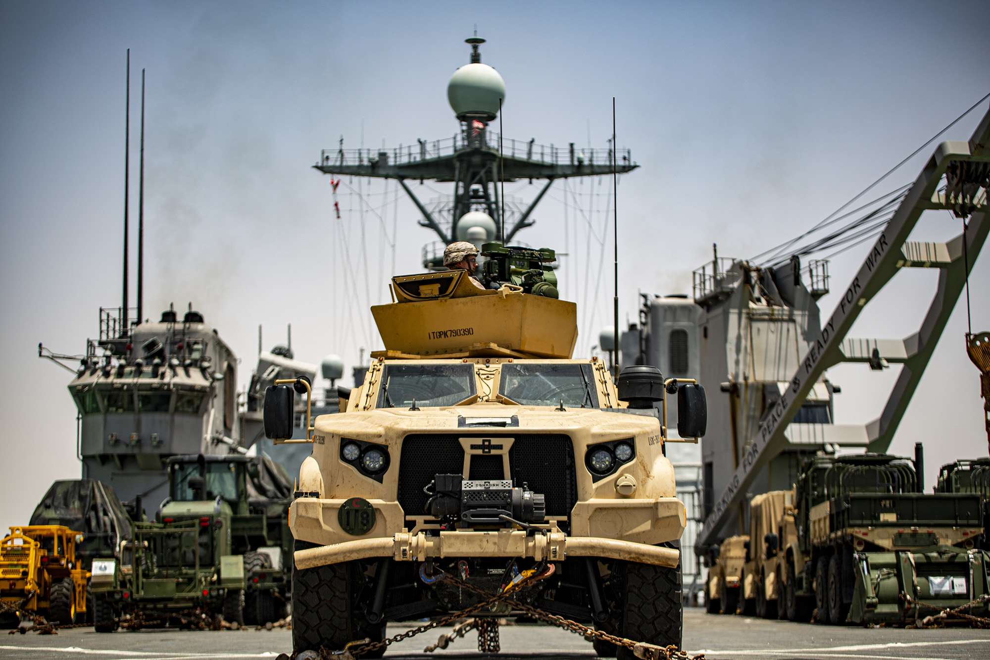 A Marine in a joint light tactical vehicle provides rear security aboard dock landing ship USS Carter Hall (LSD 50) while transiting the Suez Canal, June 1, 2021. (1st Lt. Mark Andries/Marine Corps)