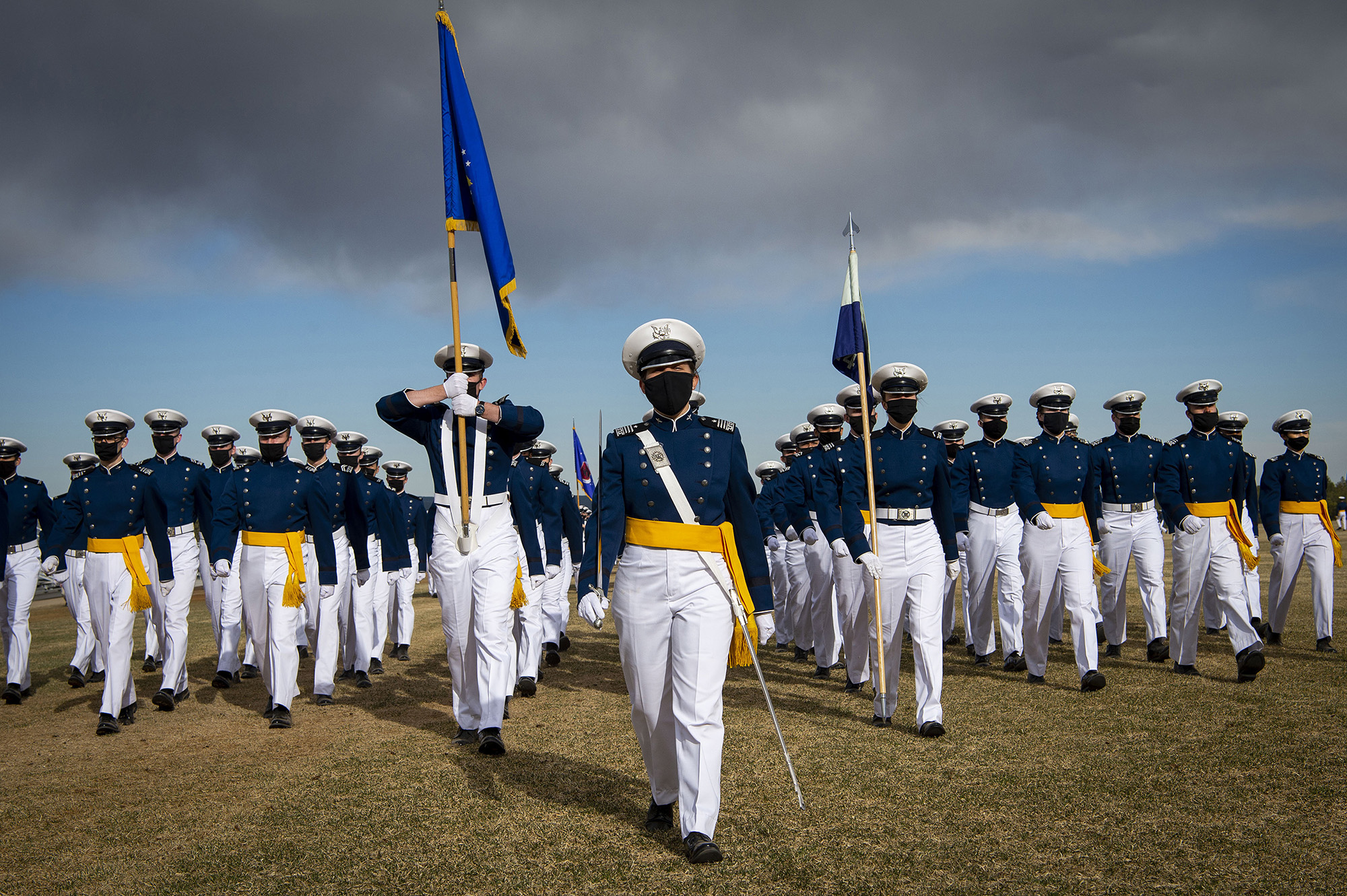 Air Force Academy cadets march on Stillman Field during the pass in review portion of the Founder’s Day Parade at Stillman Field in Colorado Spring, Colo., April 2, 2021. (Joshua Armstrong/Air Force)