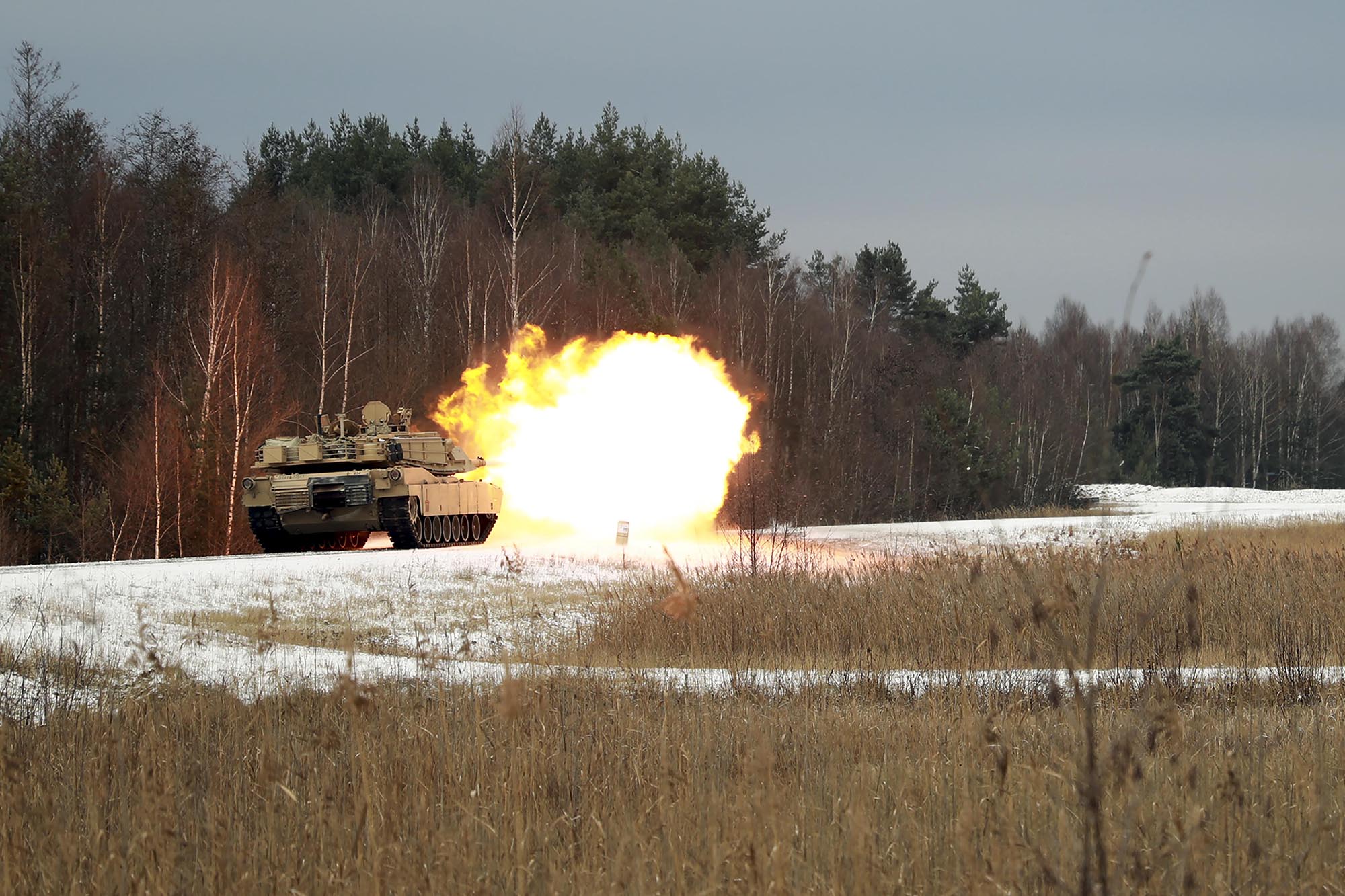 An M1 Abrams Main Battle Tank assigned to the 2nd Battalion, 5th Cavalry Regiment, 1st Armored Brigade Combat Team, 1st Cavalry Division, fires its main gun at Grafenwoehr Training Area, Germany, Dec. 2, 2020. (Army)
