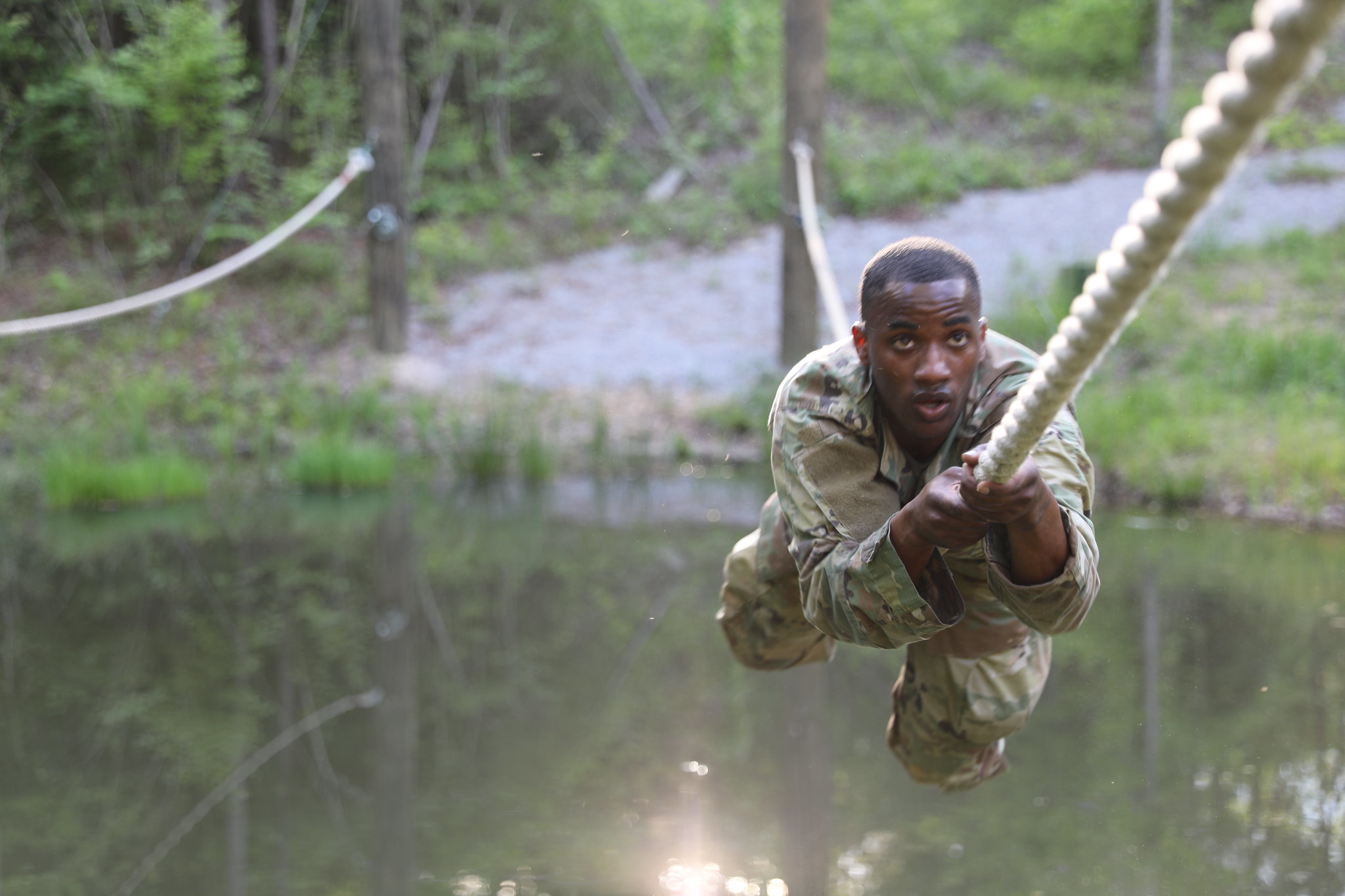Spc. Kysam Moody moves through the obstacle course at the Mississippi National Guard Best Warrior Competition at Camp Shelby Joint Forces Training Center, near Hattiesburg, Miss., April 20, 2020. (Spc. Benjamin Tomlinson/Army National Guard)