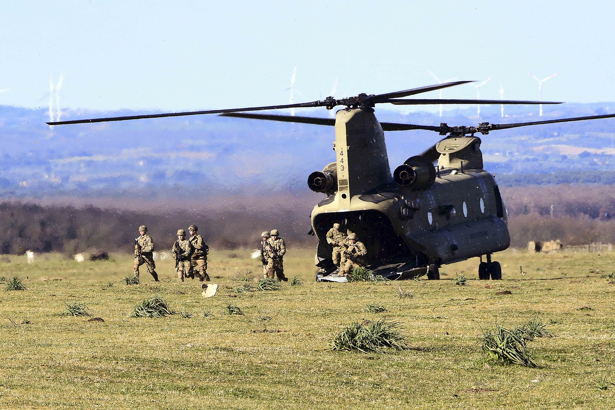 Soldiers conduct a simulated air assault from an Army CH-47 Chinook during training at Monte Romano Training Area, Italy, Jan. 27, 2021. (Elena Baladelli/Army)