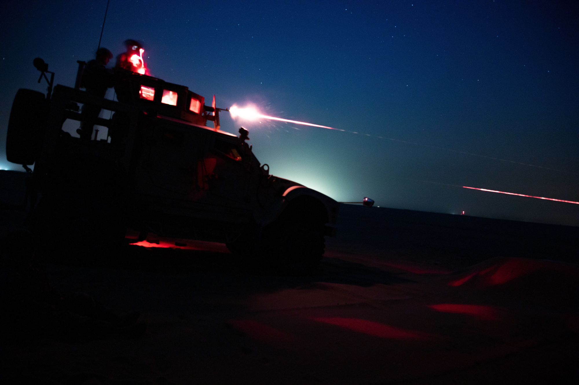 U.S. Marines fire an M240B from an MRAP All-Terrain Vehicle during night time machinegun range in Kuwait, June 16, 2020. (Cpl. Cutler Brice/Marine Corps)