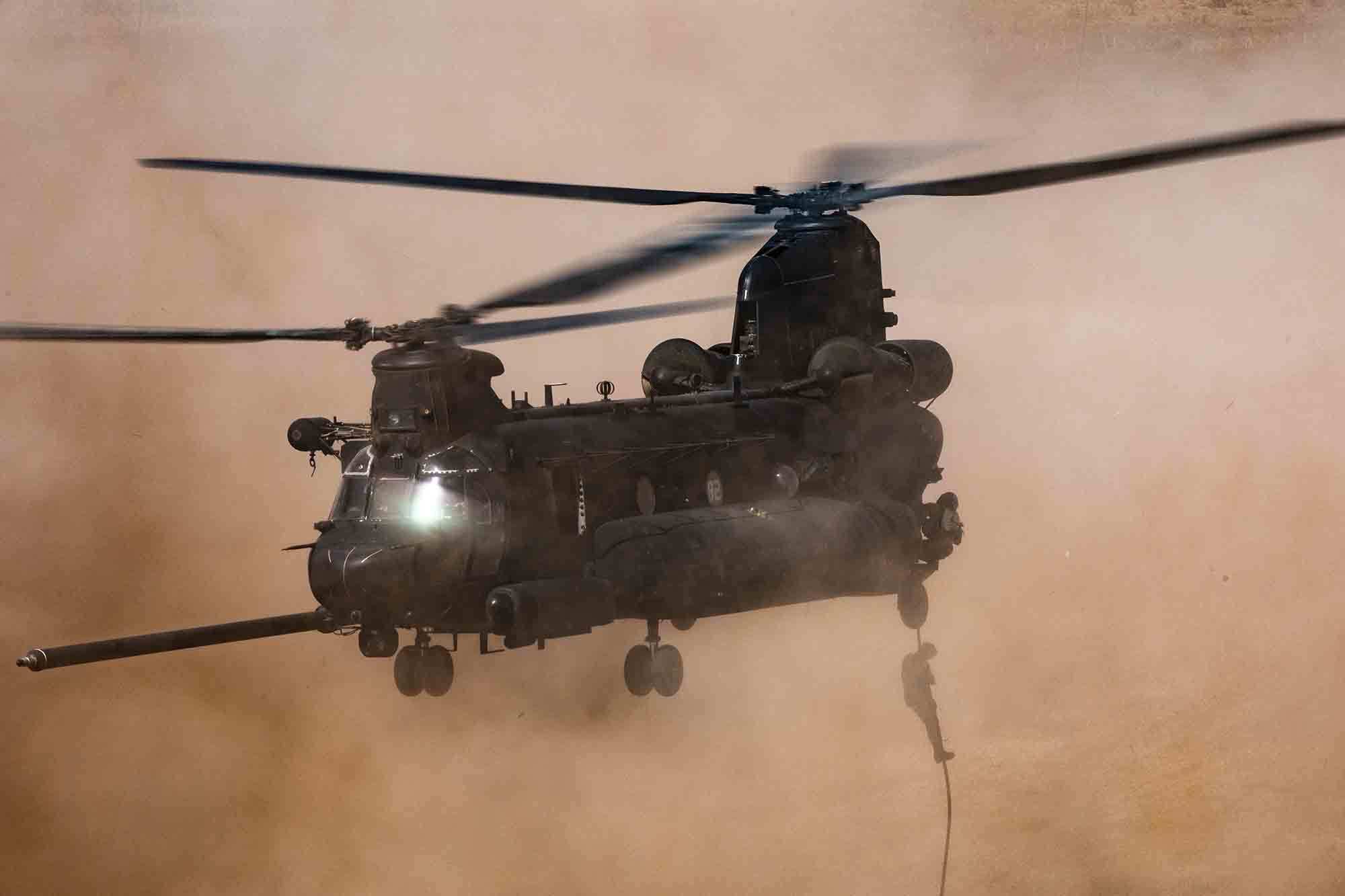 U.S. Army soldiers assigned to 19th Special Forces Group (Airborne), and Royal Moroccan Army soldiers fast-rope out of a CH-47 Chinook in Tifnit, Morocco, on June 14, 2021, during African Lion 2021. (Spc. Brendan Nunez/Army)