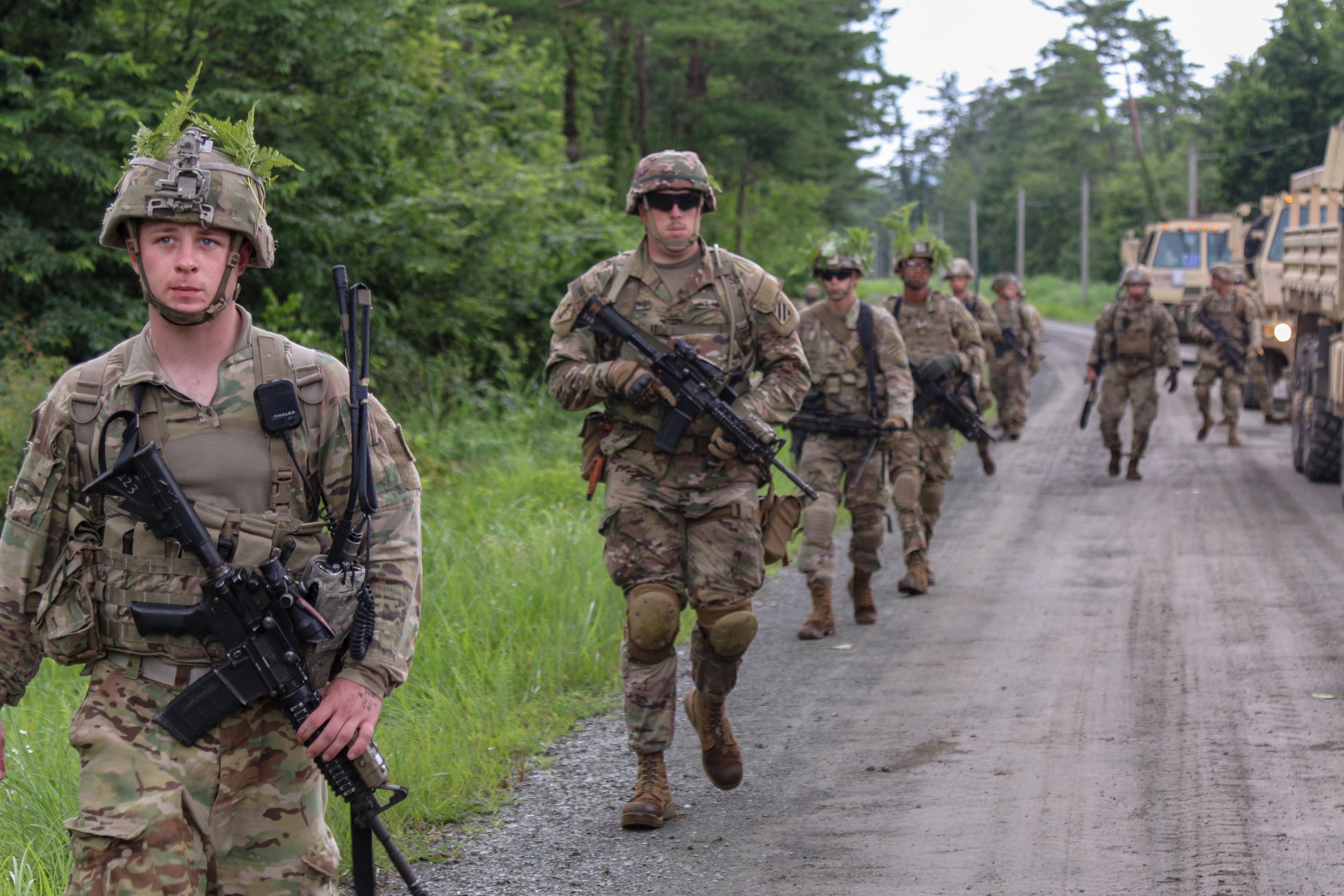 U.S. Army soldiers assigned to 1st Battalion, 28th Infantry Regiment, 3rd Infantry Division, prepare to pull road-side security July 1 on Aibano Training Area, Japan, as part of exercise Orient Shield, the largest U.S. Army and Japan Ground Self-Defense Force bilateral field training exercise. (Spc. Summer Keiser/Army)