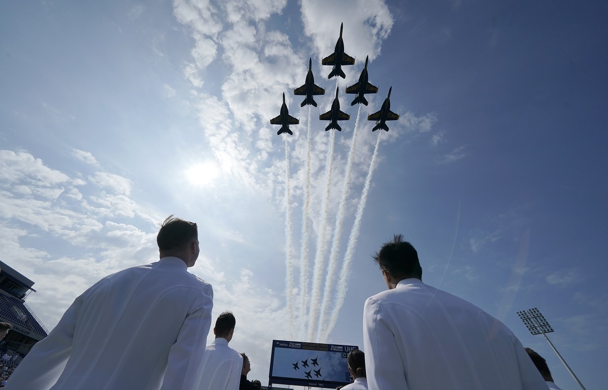 The Blue Angels fly over the graduation and commissioning ceremony at the U.S. Naval Academy in Annapolis, Md., Friday, May 28, 2021. (AP Photo/Julio Cortez)