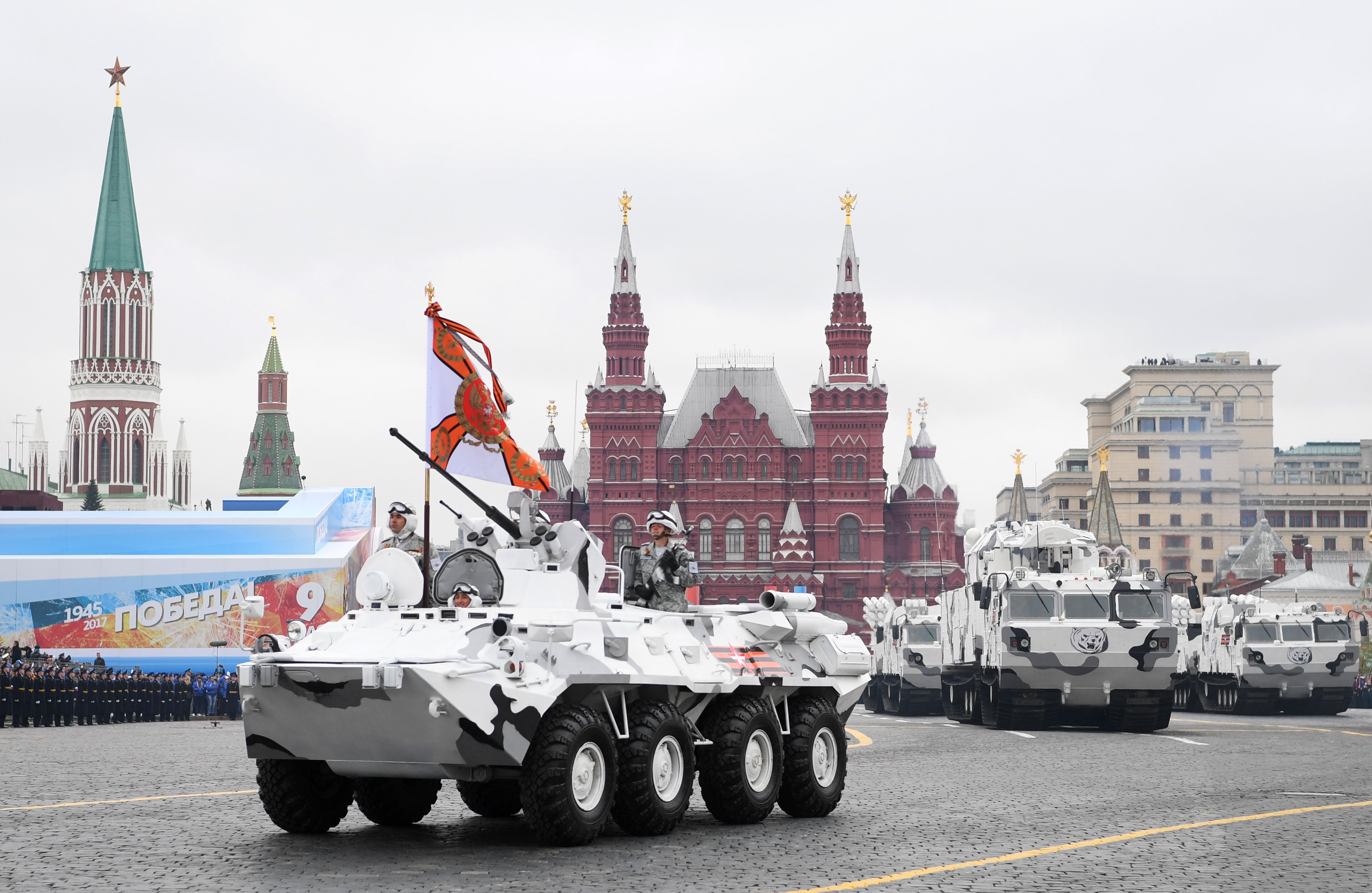 Russian TOR-M2 tactical surface-to-air missile systems and Pantsir-SA air defense systems are decked out in their Arctic colors as they ride through Red Square during a military parade in Moscow on May 9, 2017. (Natalia Kolesnikova/AFP via Getty Images)