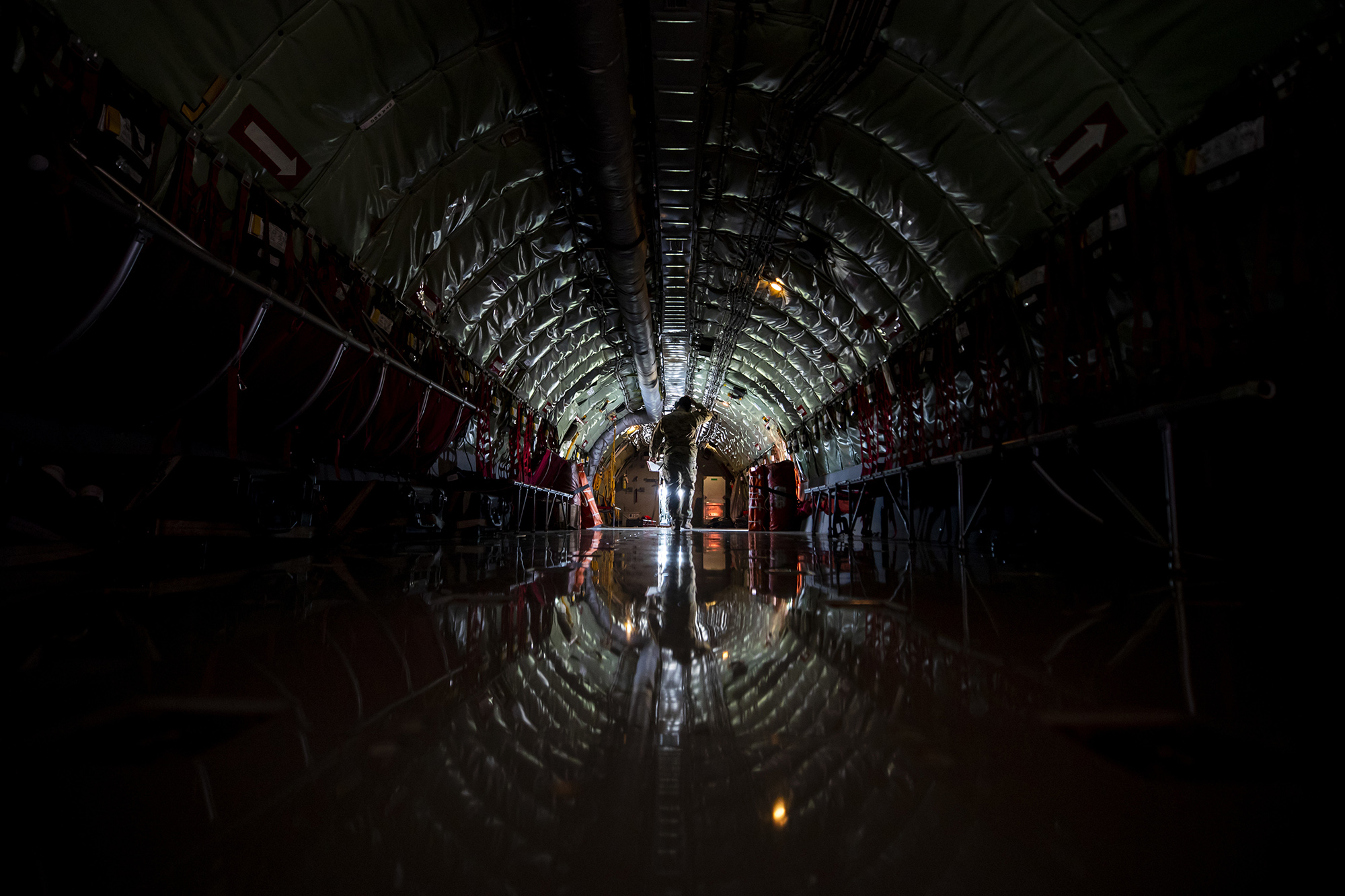 Tech. Sgt. Vince Stokes, 141st Air Refueling Squadron book operator, walks through a KC-135R Stratotanker at Fairchild Air Force Base, Wash., May 6, 2021. (Master Sgt. Matt Hecht/Air National Guard)