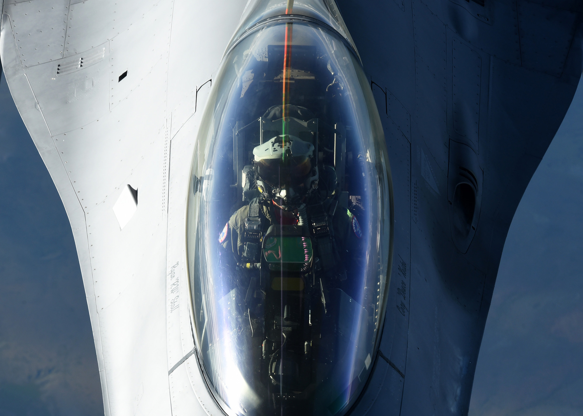 An Air Force F-16 Fighting Falcon receives fuel from a KC-10 Extender on July 3, 2020. The F-16, and other military aircraft, flew over Mount Rushmore in South Dakota during a