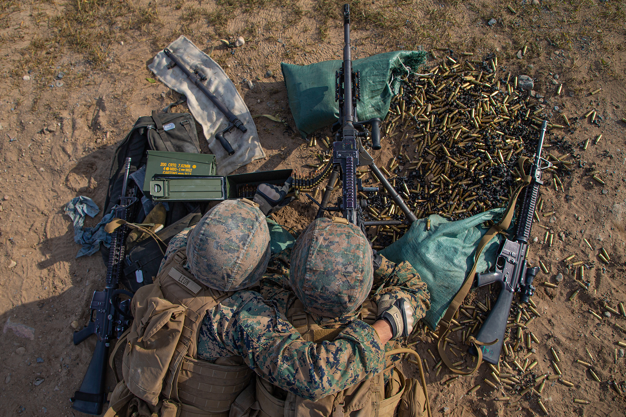 Marines fire an M240B machine gun during a team defense range as part of MEFEX 21.1 at Fort Drum, N.Y., Nov. 6, 2020. (Lance Cpl. Scott Jenkins/Marine Corps)