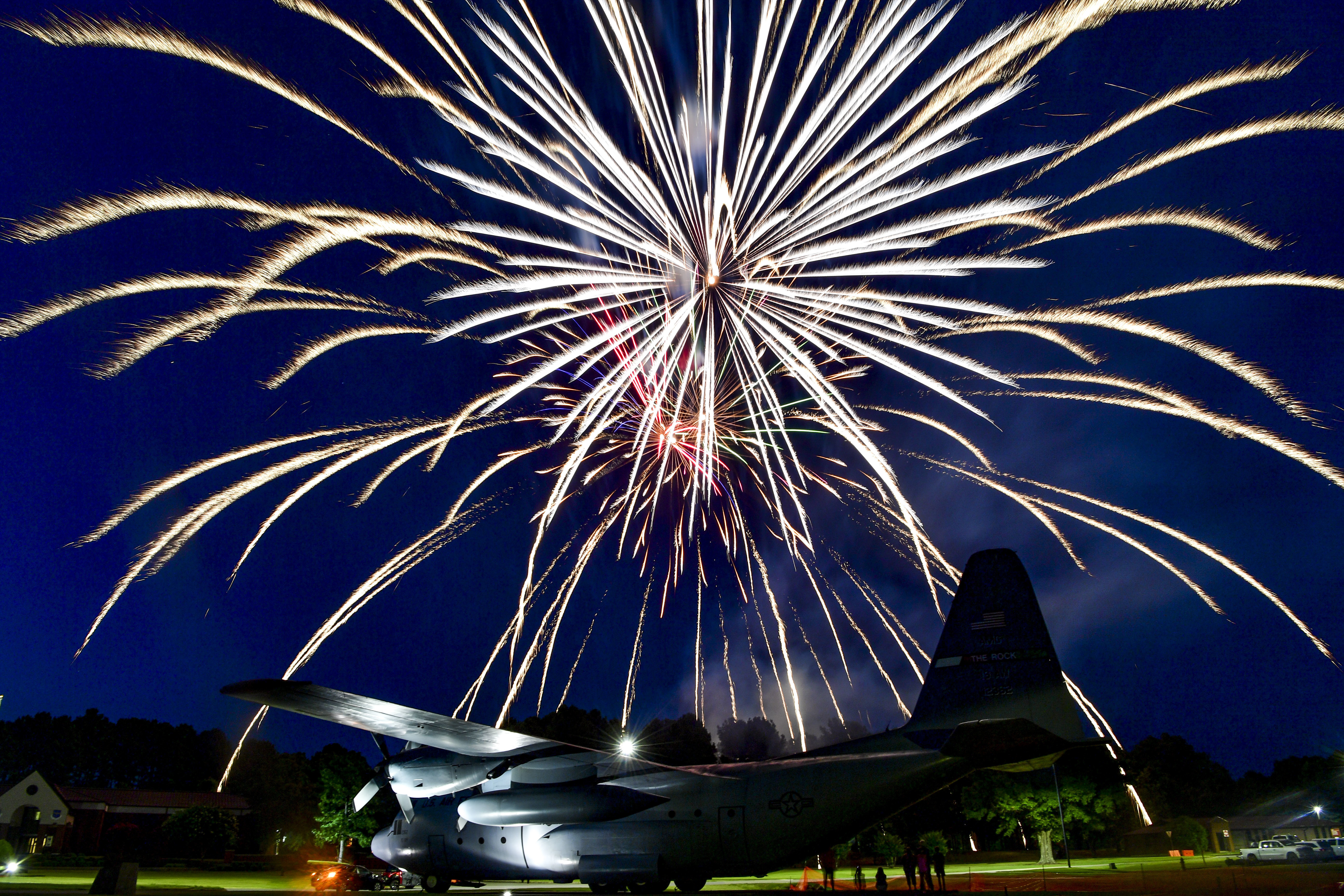 Fireworks light up the sky over a C-130H at Heritage Park to conclude the sixth annual Liberty Fest at Little Rock Air Force Base, Arkansas, July 2. (2nd Lt. Charles Rivezzo/Air Force)