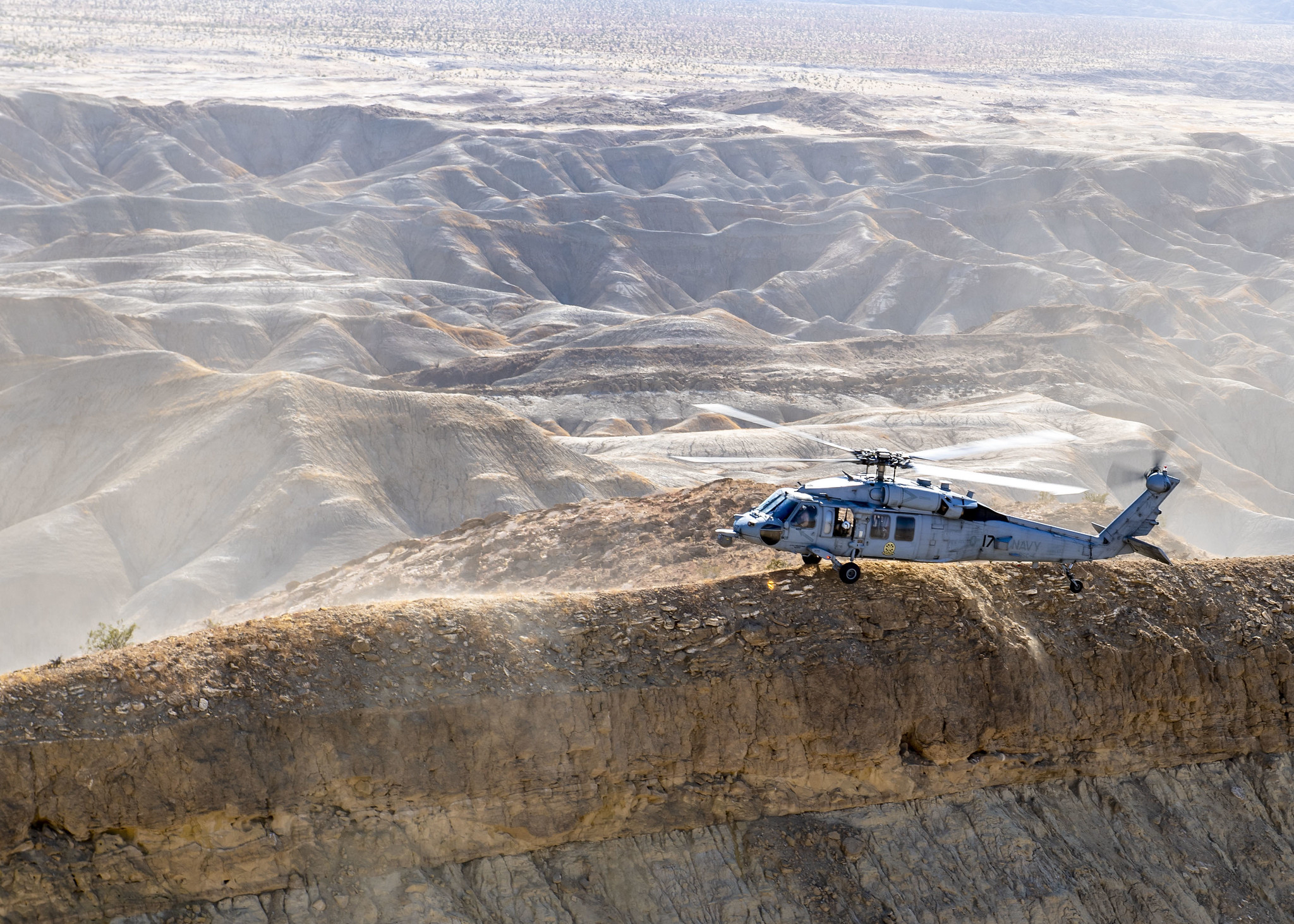An MH-60S Sea Hawk helicopter stationed in San Diego practices terrain flight tactical landings on Oct. 1, 2020, during Helicopter Advanced Readiness Program (HARP) training at Naval Air Facility El Centro, Calif. (MC2 Ryan M. Breeden/Navy)