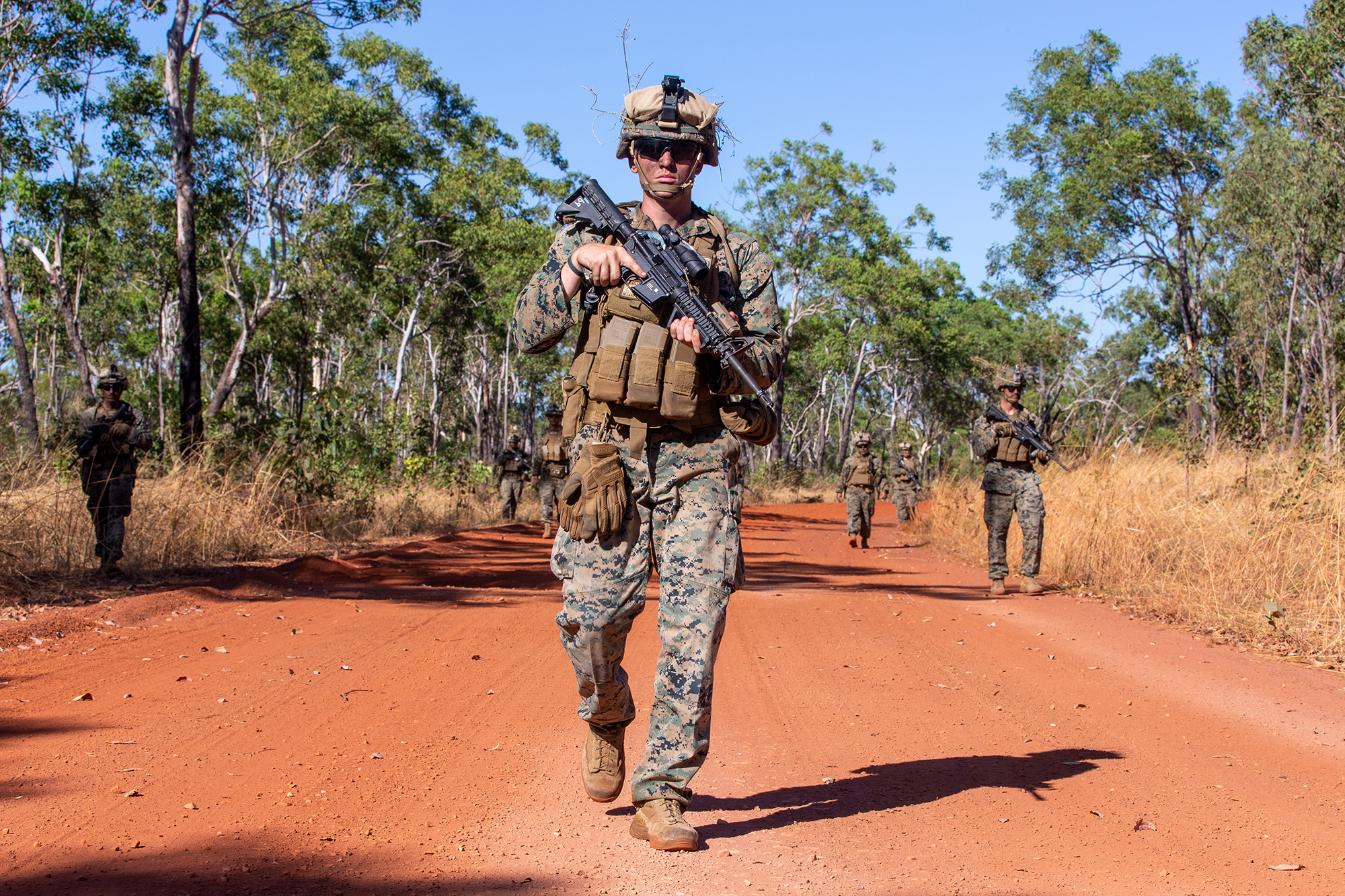 Marine Corps Cpl. Dalton Boswell walks in formation May 28, 2021, during ground threat reaction drills at Mount Bundy Training Area, NT, Australia. (Master Sgt. Sarah Nadeau/Marine Corps)