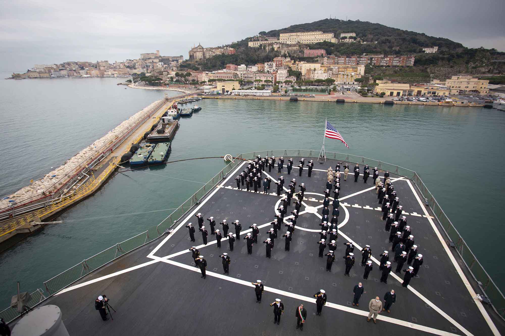 The crew of the USS Mount Whitney stands in formation during the ship’s 50th anniversary celebration in Gaeta, Italy, Jan. 14, 2021. (Petty Officer 2nd Class Jared Kercell/Navy)