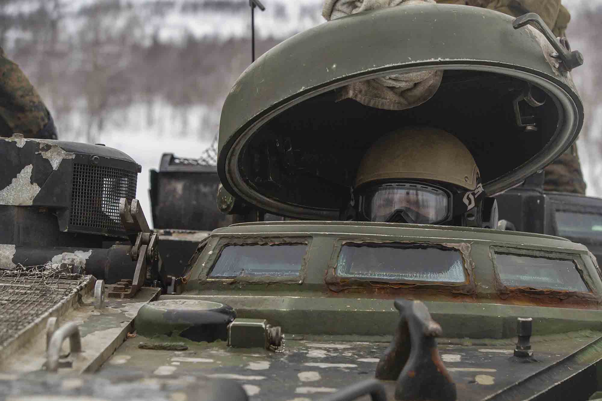Marines with Marine Rotational Force Europe 21.1 (MRF-E), Marine Forces Europe and Africa, prepare to conduct a live-fire range using Assault Amphibious Vehicles (AAV) in Blatindan, Norway, March 16, 2021. (Cpl. Jesse Carter-Powell/Marine Corps)