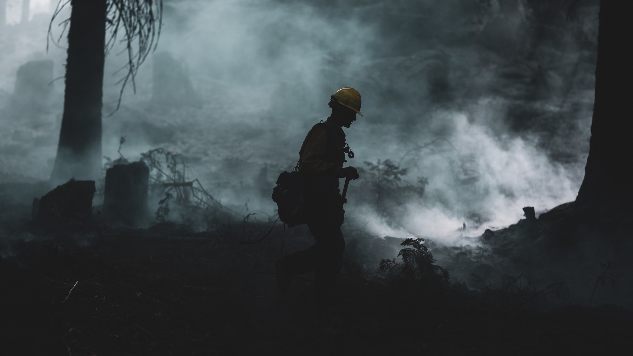 A U.S. Marine assigned to the 7th Engineer Support Battalion, 1st Marine Logistics Group, conducts wildland firefighting operations in O'Neals, Calif., near the Sierra National Forest, Sept. 26, 2020. Approximately 250 Marines from 7th ESB are going to help fight the Creek Fire in central California. (Warrant Officer Eric LaClair/Marine Corps)