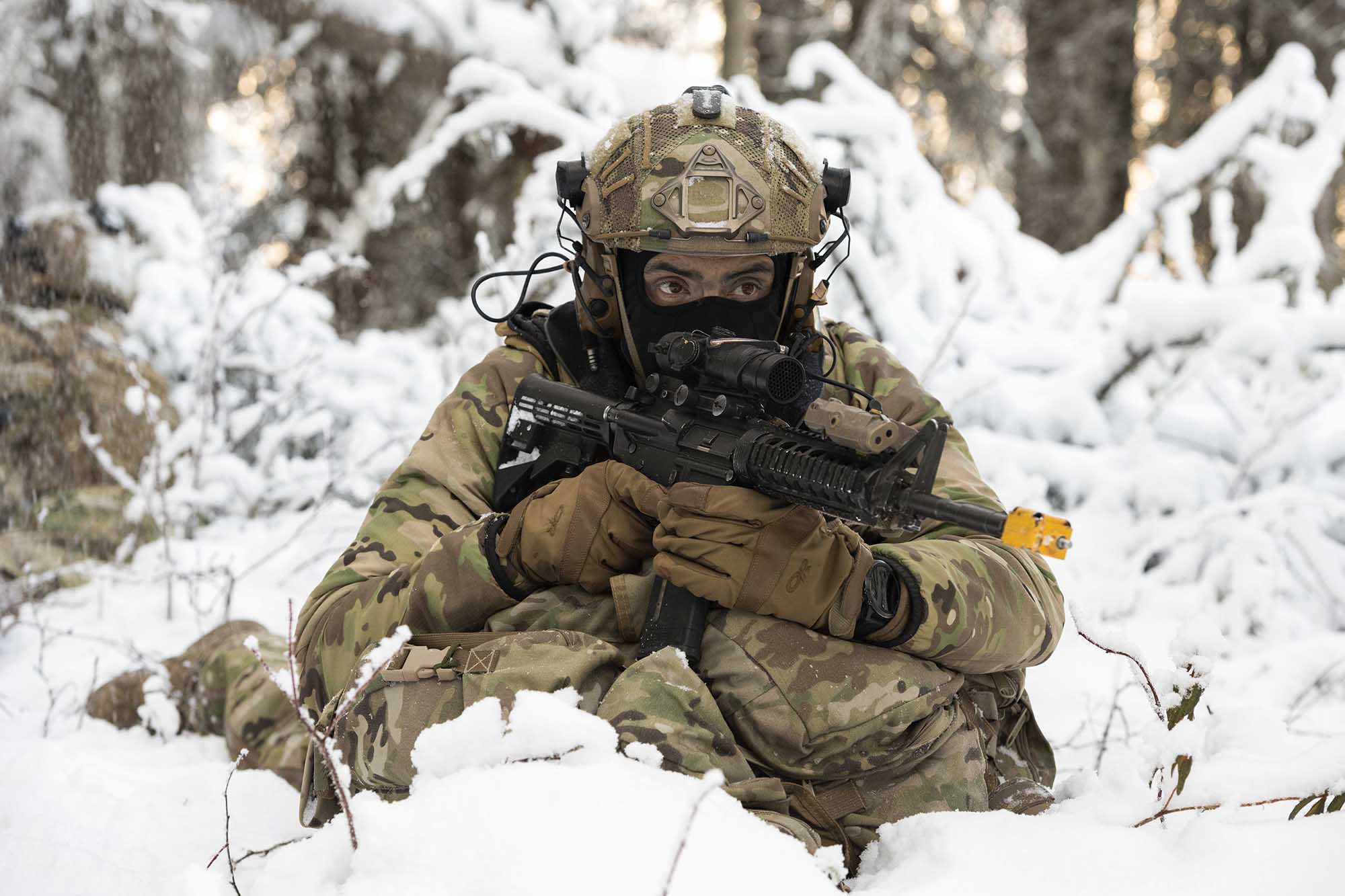 Senior Airman Bryan Guerrero, a tactical air control party apprentice assigned to the 3rd Air Support Operations Squadron, provides security during a patrol halt while conducting small unit training at Joint Base Elmendorf-Richardson, Alaska, Nov. 18, 2020. (Alejandro Pena/Air Force)