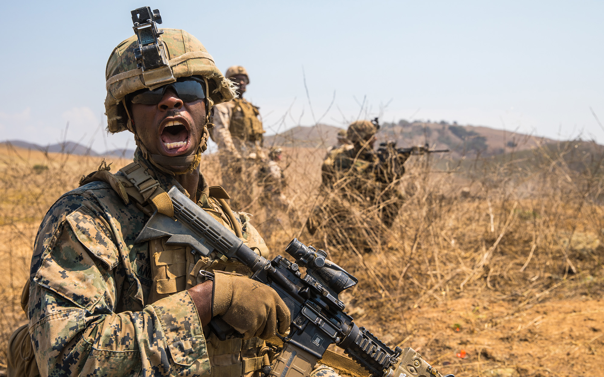 Marine Corps Lance Cpl. Joshua Anderson relays commands to his fire team while conducting offensive operations during the Supersquad 2020 Competition at Marine Corps Base Camp Pendleton, Calif., Aug. 20, 2020. (Staff Sgt. Kyle C. Talbot/Marine Corps)