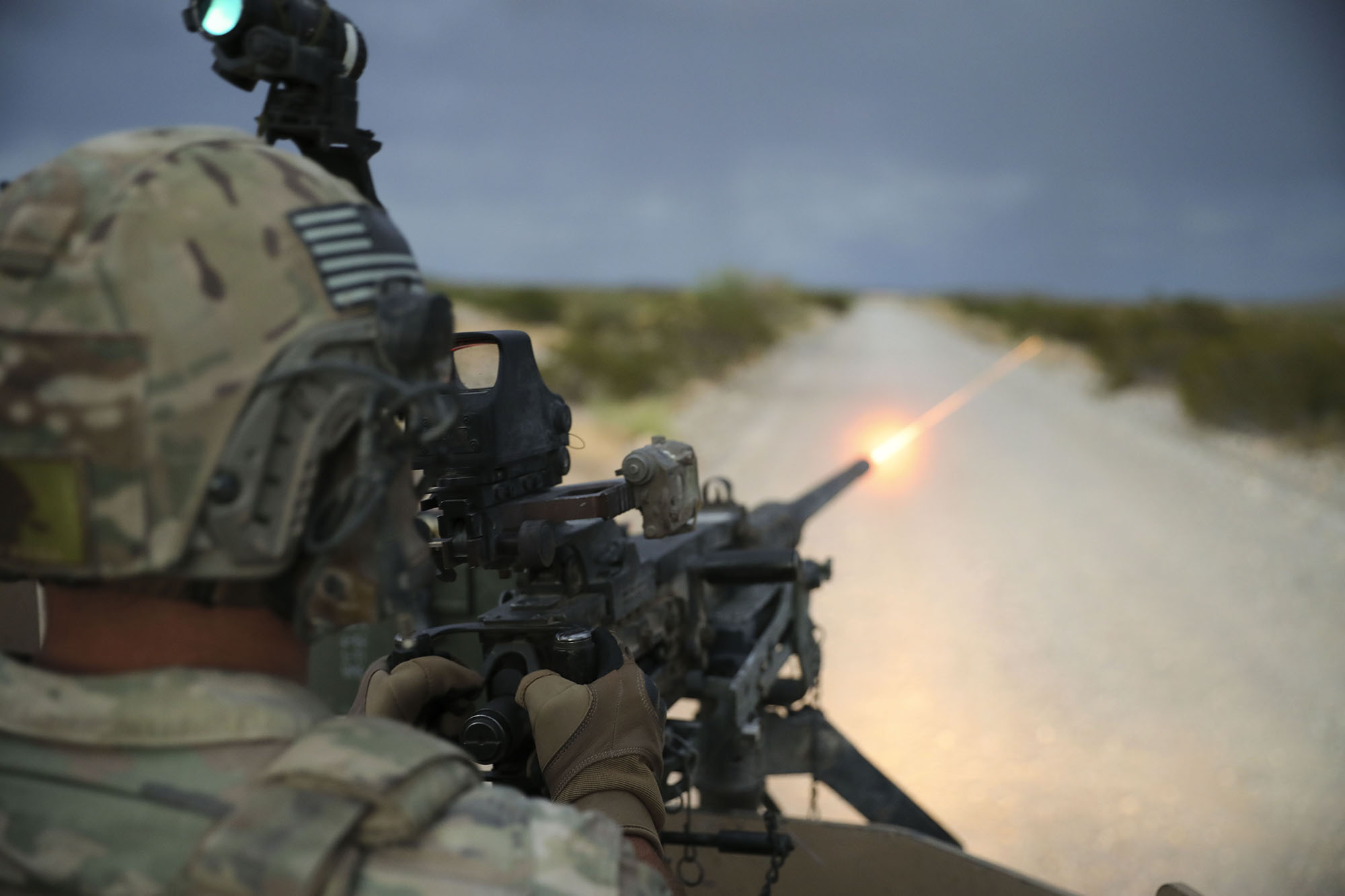 Capt. Matthew Sneddon, 3rd Brigade, 1st Armored Division, fires a vehicle-mounted M2 Browning machine gun on Aug.14, 2020, at Fort Bliss, Texas. (Sgt. Daniel Mariscal/Army)