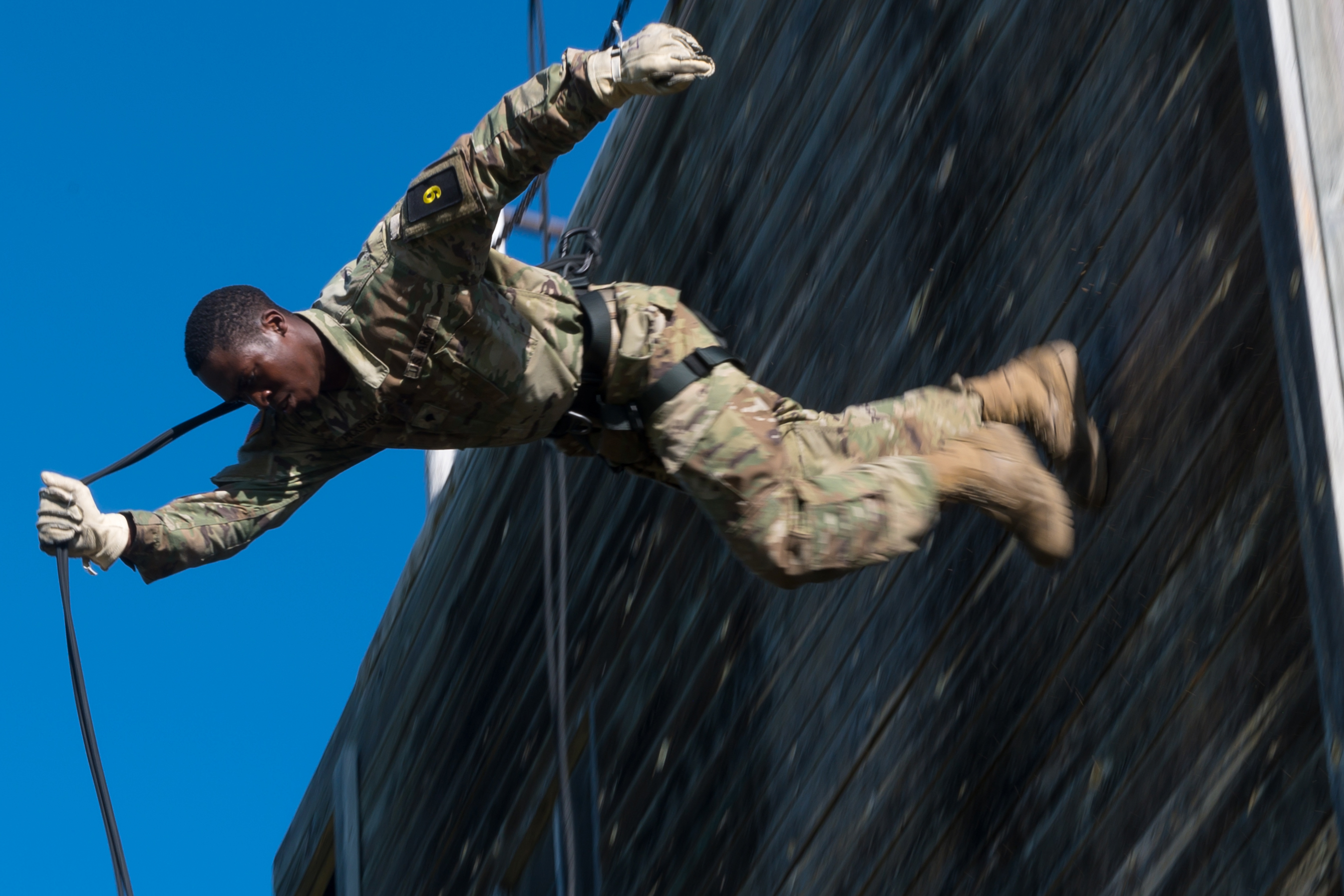 Spc. LeSean Pickstock, 957th Engineer Company, repels down a tower during the North Dakota National Guard Best Warrior Competition at Camp Gilbert C. Grafton, N.D., on Aug. 16, 2020. The competition challenges participants on multiple aspects of Soldier tasks. (Spc. Kristin L. Berg/Army National Guard)