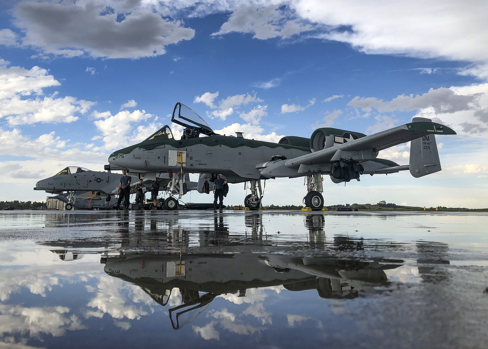 A-10 Thunderbolt IIs, assigned to the A-10 Demonstration Team, sit on the flightline at Cheyenne Air National Guard Base, Wyo., July 20, 2020. (Senior Airman Kristine Legate/Air Force)