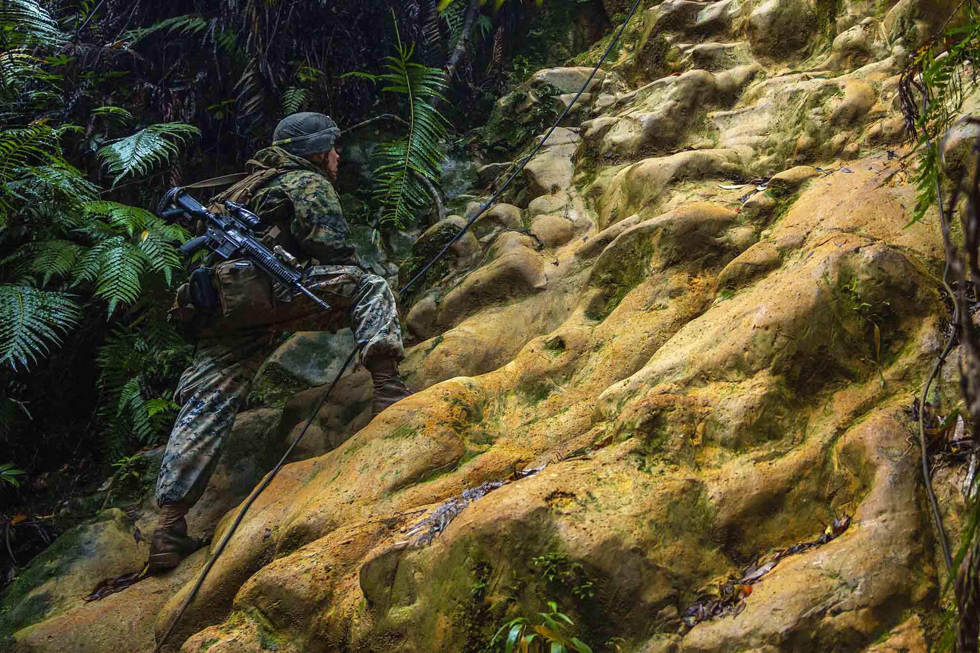 U.S. Marine Corps Lance Cpl. Ethan Sawyer conducts route reconnaissance during the 3d Marine Division Rifle Squad Competition at Camp Gonsalves, Okinawa, Japan, Jan. 11, 2021. (Lance Cpl. Scott Aubuchon/Marine Corps)