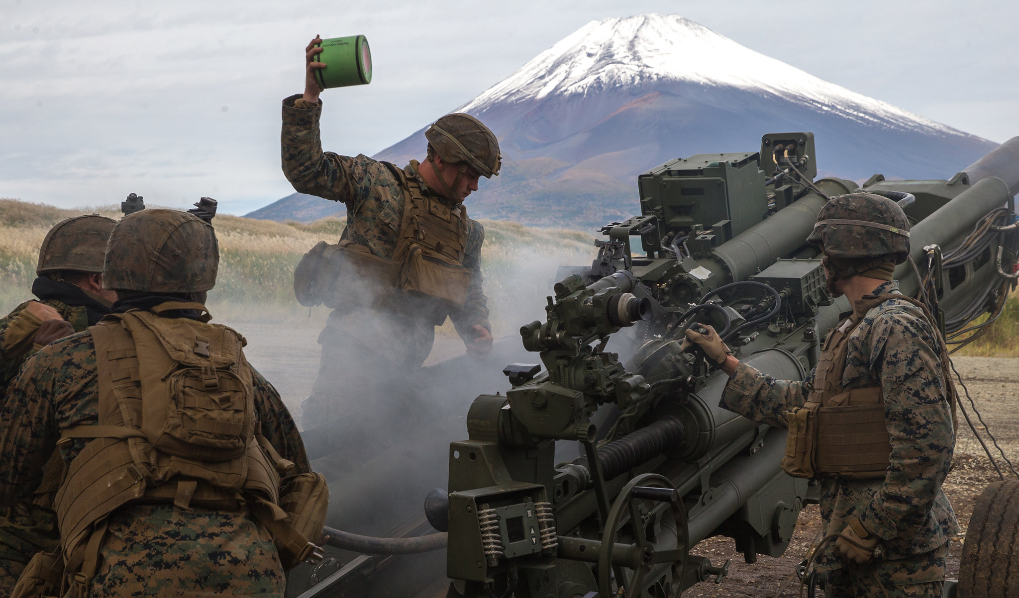 U.S. Marines prepare to fire an M777A2 155mm Howitzer as a part of the Artillery Relocation Training Program 20.3 at Combined Arms Training Center, Camp Fuji, Japan, Oct. 20, 2020. (Cpl. Savannah Mesimer/Marine Corps)