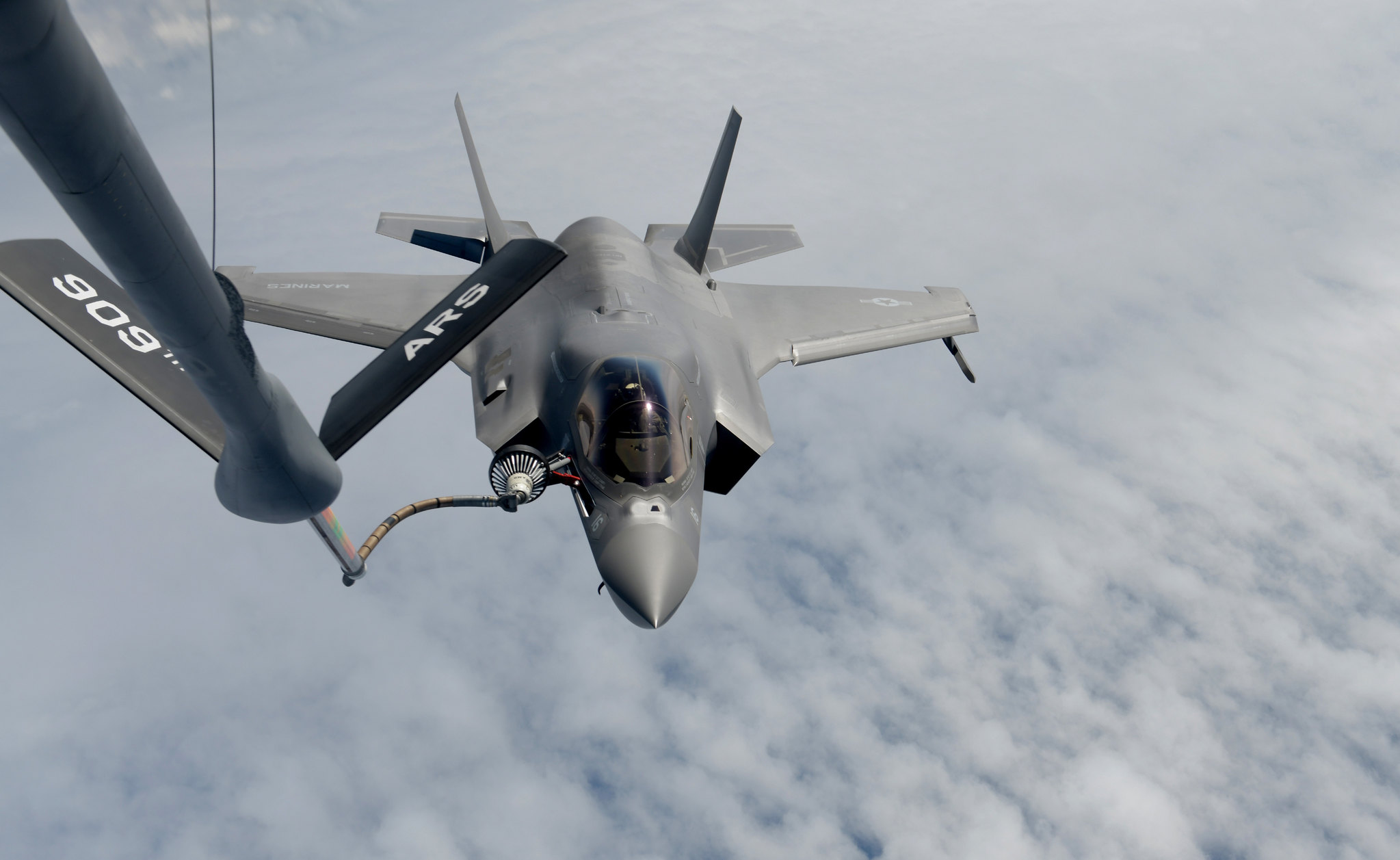A U.S. Marine Corps F-35B Lightning II from Marine Corps Air Station Iwakuni, Japan, conducts aerial refueling with a KC-135 Stratotanker from Kadena Air Base, Japan, over the Pacific Ocean, April 20, 2021. (Staff Sgt. Daryn Murphy/Air Force)