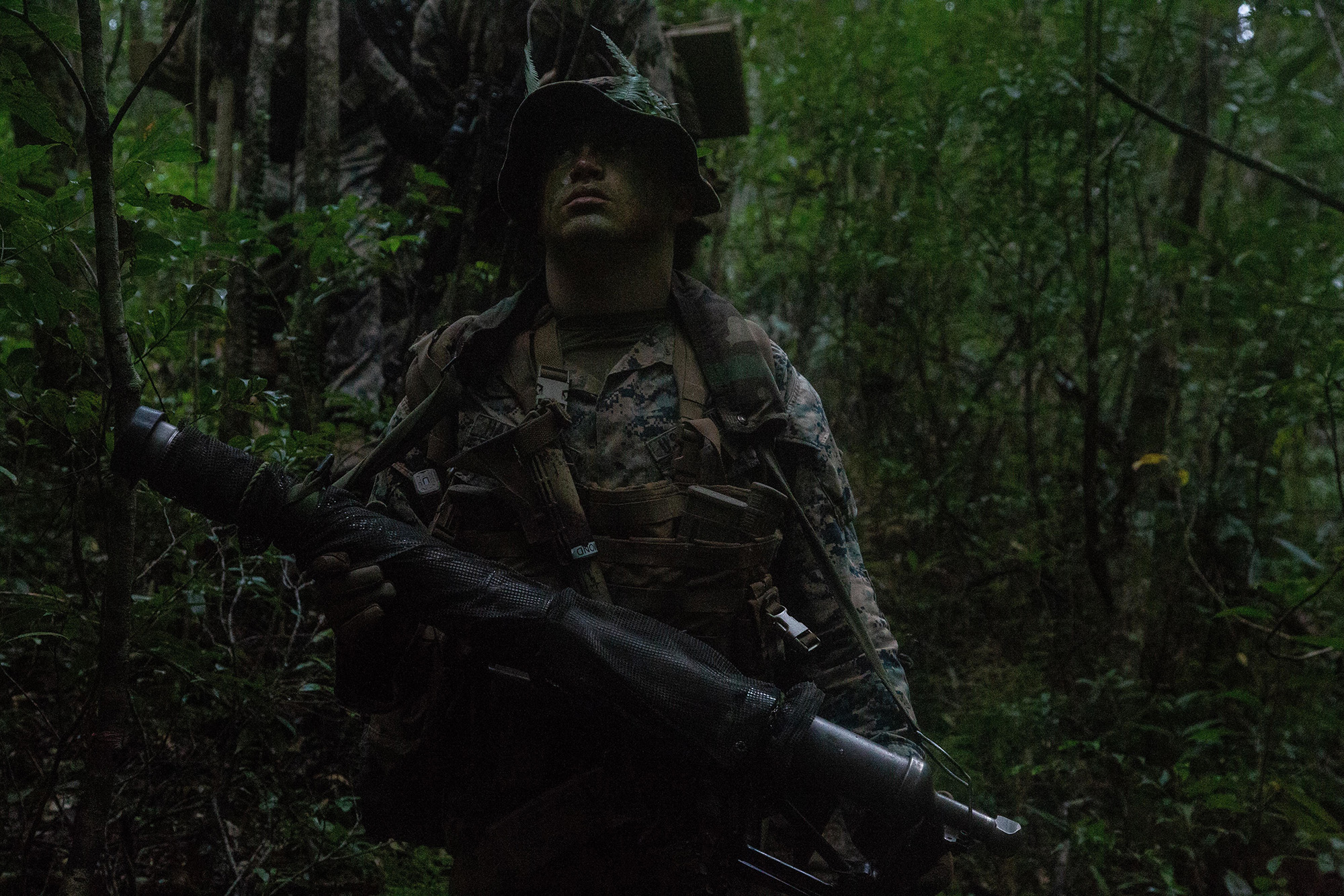 A U.S. Marine patrols during a force-on-force exercise at Camp Gonsalves, Okinawa, Japan on Oct. 16, 2020. (Lance Cpl. Kolby Leger/Marine Corps)