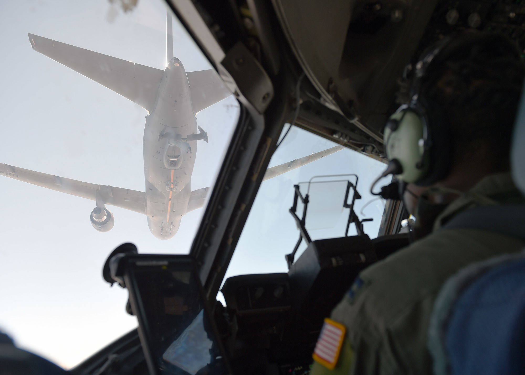 Capt. Edmond Duvall, 7th Airlift Squadron pilot, prepares to aerial refuel a C-17 Globemaster III from a KC-46 Pegasus from Fairchild Air Force Base, Wash., over Washington state, Aug. 5, 2020. The KC-46 Pegasus is the Air Force’s newest refueling aircraft and many pilots are still learning and being certified on how to conduct refueling. (Airman 1st Class Mikayla Heineck/Air Force)