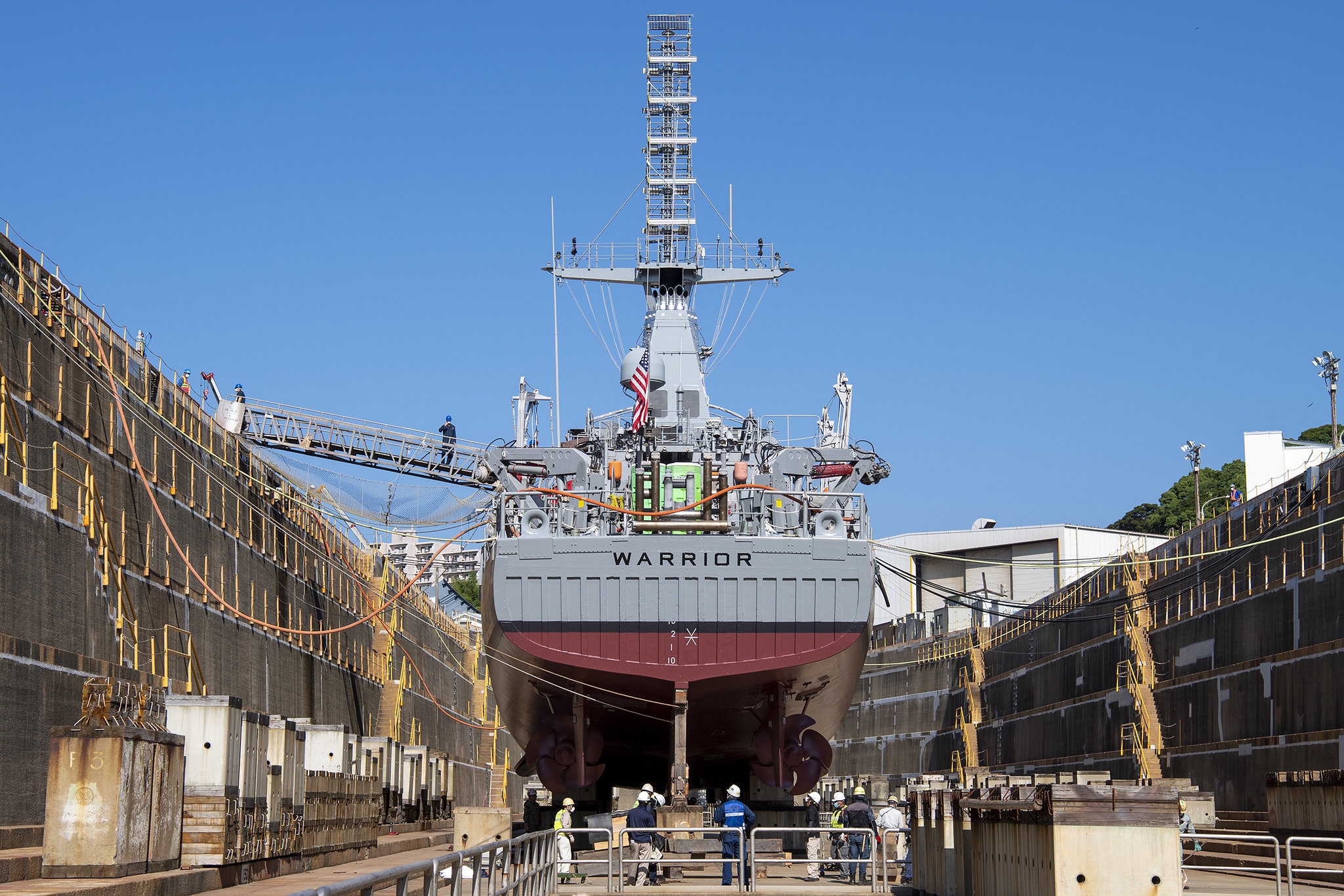Ship repair facility personnel prepare to refloat the Avenger-class mine countermeasure ship USS Warrior (MCM 10) on June 10, 2020, in Sasebo, Japan. (David A. Berlin/Navy)