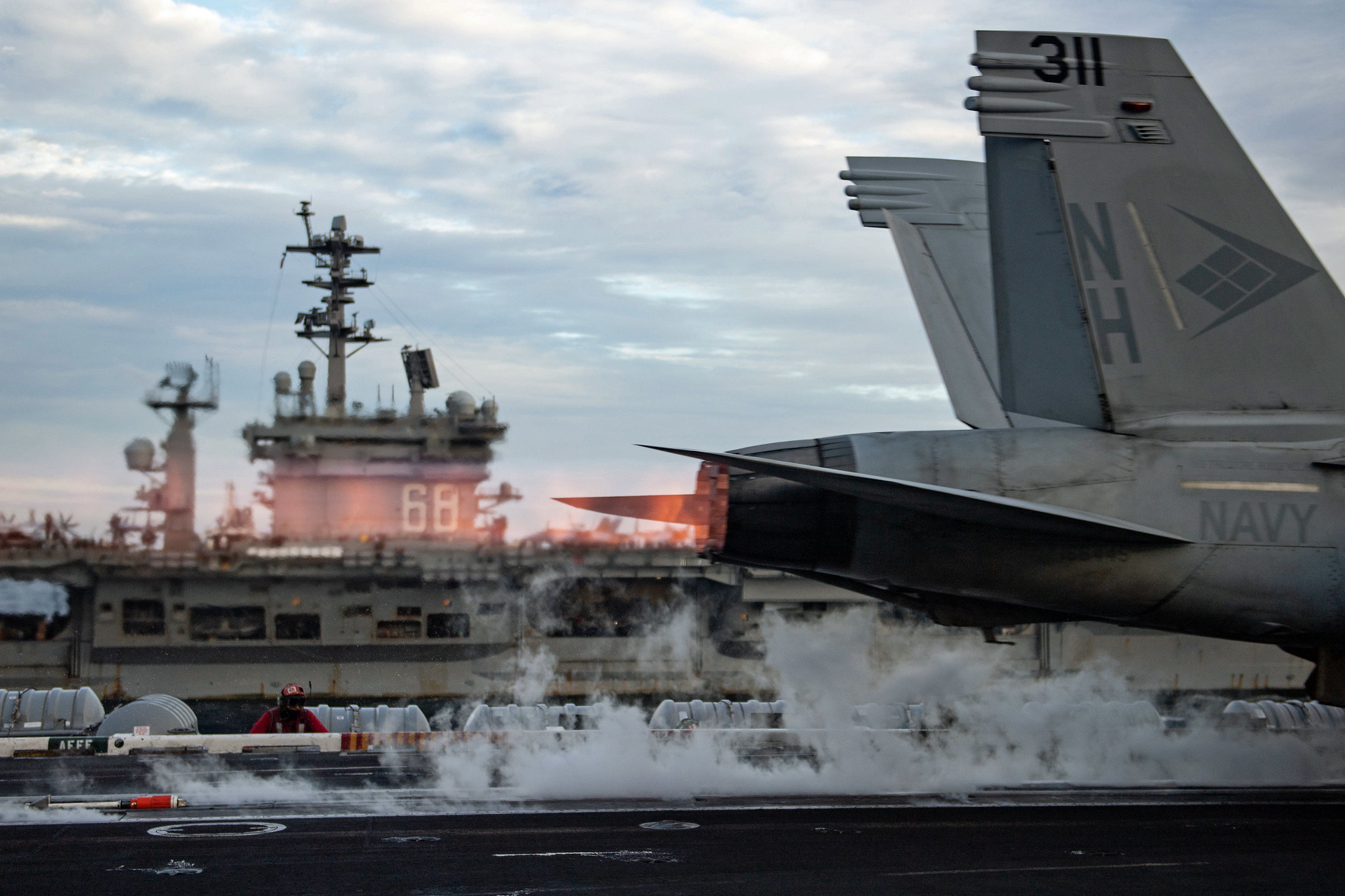 An F/A-18E Super Hornet launches from the flight deck of USS Theodore Roosevelt (CVN 71) while conducting dual-carrier operations with the Nimitz Carrier Strike Group in the South China Sea on Feb. 9, 2021. (MC2 Zachary Wheeler/Navy)