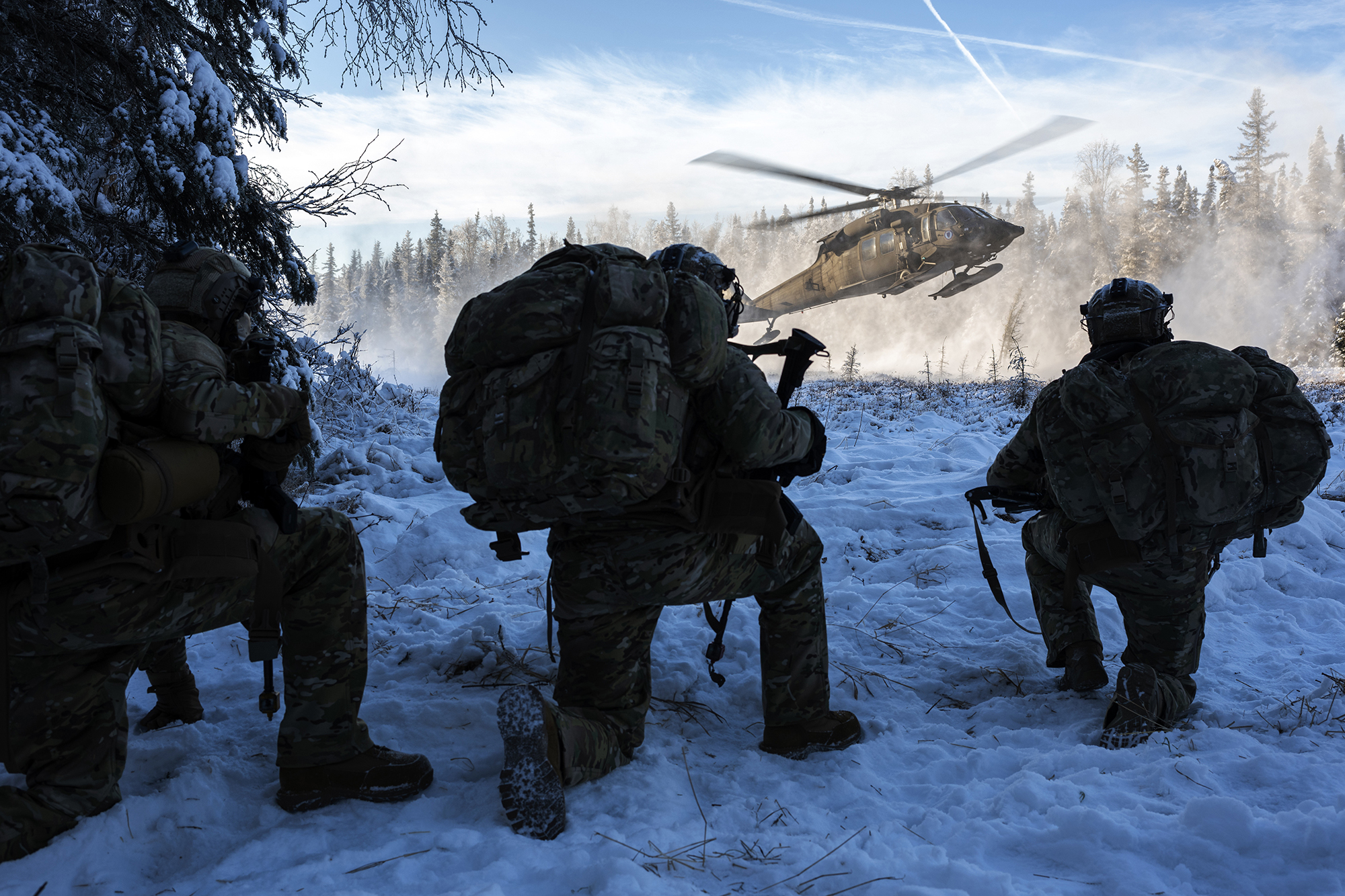 An Alaska Army National Guard UH-60L Black Hawk helicopter lands to pick up Air Force special warfare airmen during small-unit training at Joint Base Elmendorf-Richardson, Alaska, Nov. 18, 2020. (Alejandro Pena/Air Force)