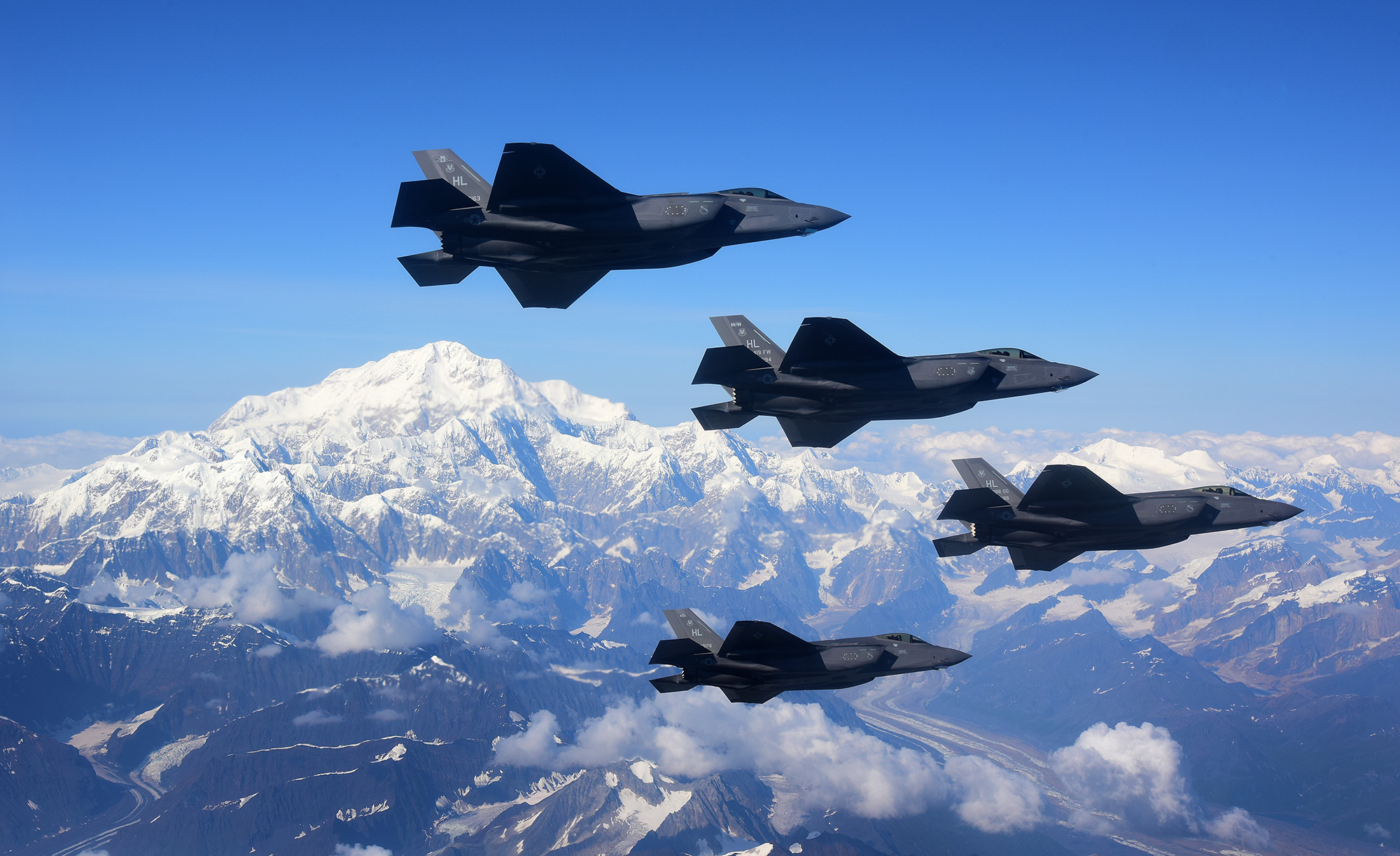 Four F-35A Lightning IIs fly in formation over Denali National Park, Alaska, Aug. 17, 2020. (Tech. Sgt. Jerilyn Quintanilla/Air Force)