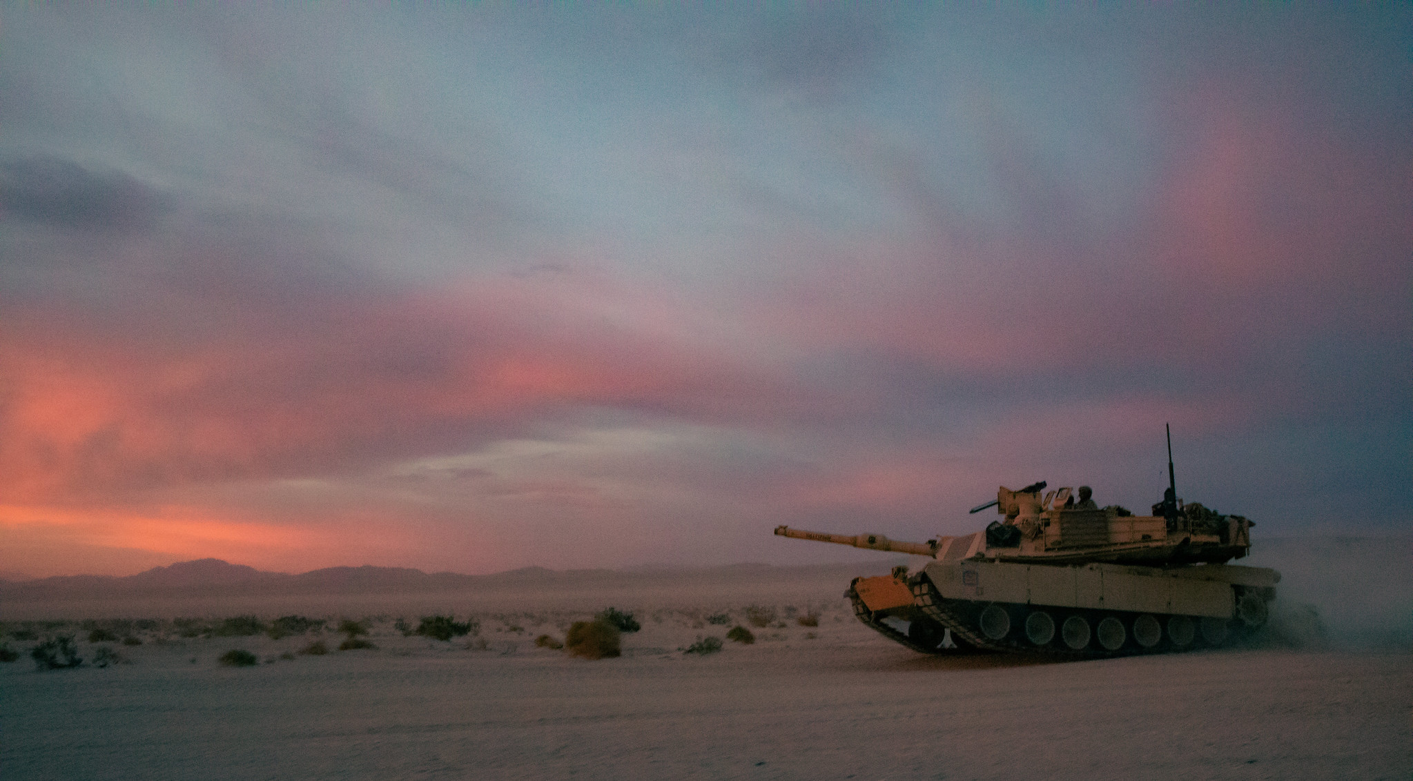 An M1A2 Abrams tank assigned to the 155th Armored Brigade Combat Team, Mississippi Army National Guard, conducts maneuvers during training at the National Training Center, Fort Irwin, Calif., June 7, 2021. (Spc. Micah Longmire/Mississippi National Guard)