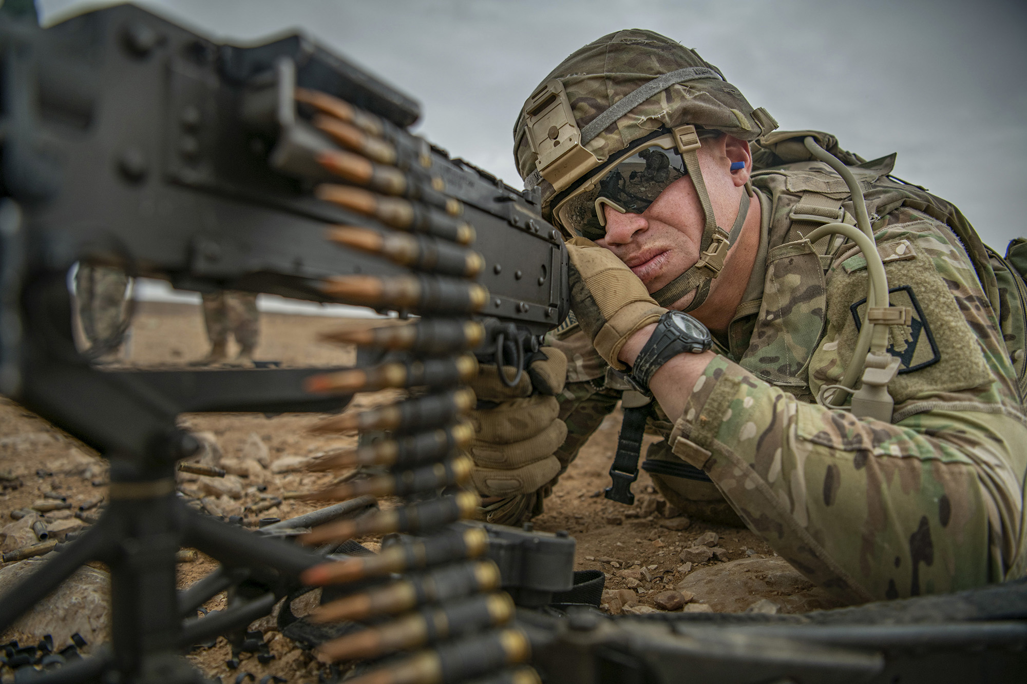 Staff Sgt. Dakota Montgomery fires an M240 machine gun during a weapon familiarization range on Nov. 28, 2020, while deployed to the Middle East in support of Operation Spartan Shield and Operation Inherent Resolve. (Sgt. Dustin D. Biven/Army)