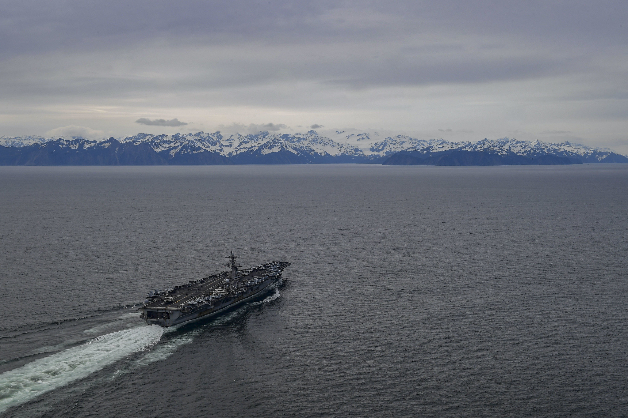 The aircraft carrier USS Theodore Roosevelt (CVN 71) transits the Gulf of Alaska, May 7, 2021, in support of flight operations above the Joint Pacific Alaska Range Complex and Gulf of Alaska during Exercise Northern Edge 2021 (NE21). (MC3 Brandon Richardson/Navy)