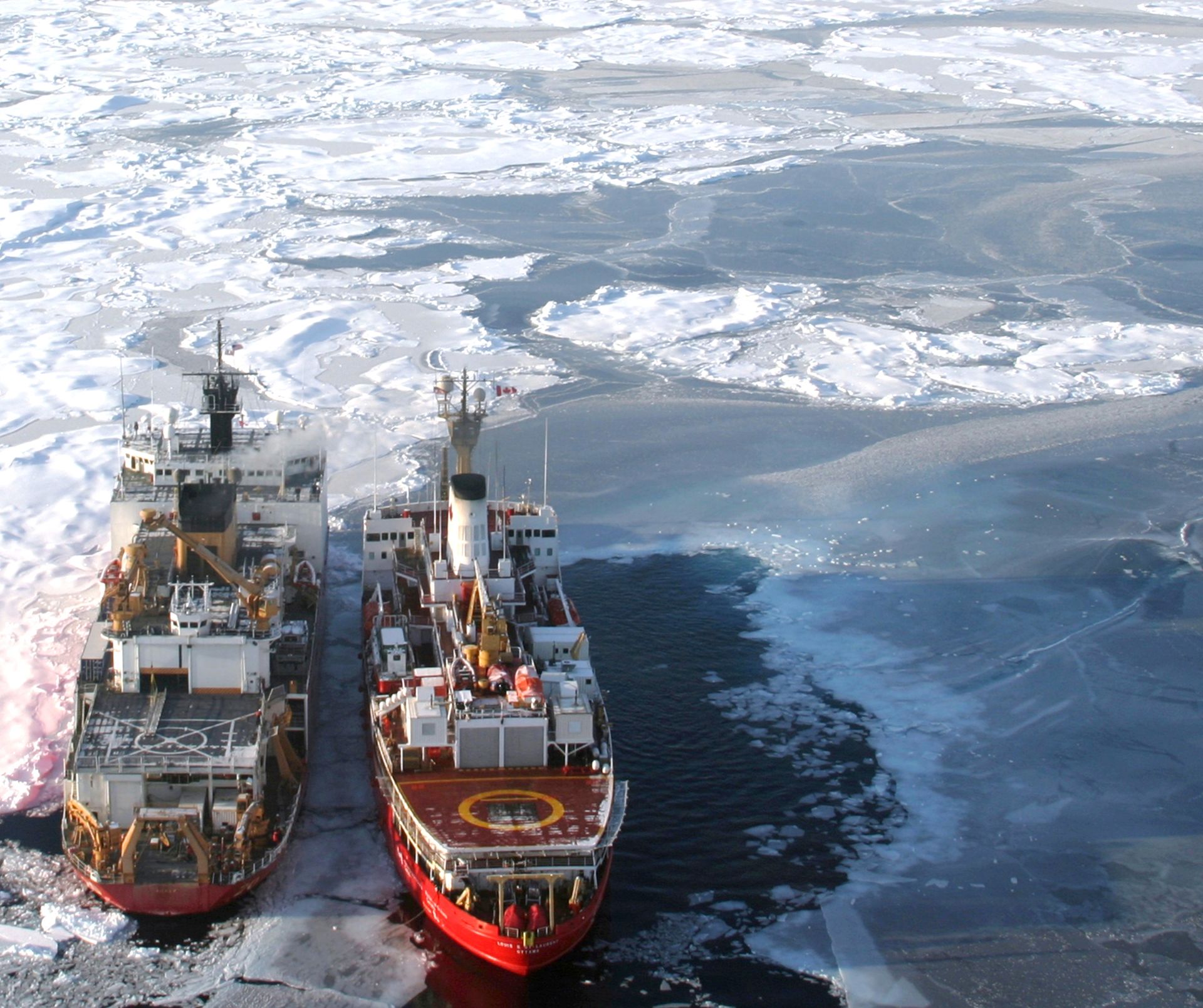 Canadian Coast Guard ship Louis S. St. Laurent alongside U.S. Coast Guard cutter Healy in the Arctic Ocean helped map the Arctic seafloor and gather data to help define the outer limits of the continental shelf in the region. (Jessica Robertson/U.S. Geological Survey)