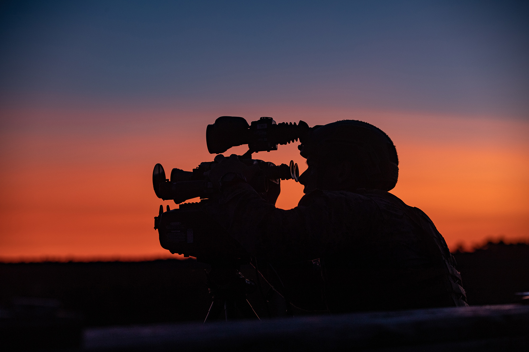 Marine Corps Staff Sgt. Brock Legant, an instructor at Scout Sniper Instructor School, rehearses his skills on night observation equipment during Tactical Air Control Party 1-21 on Camp Lejeune, N.C., Nov. 3, 2020. (Lance Cpl. Jacqueline Parsons/Marine Corps)