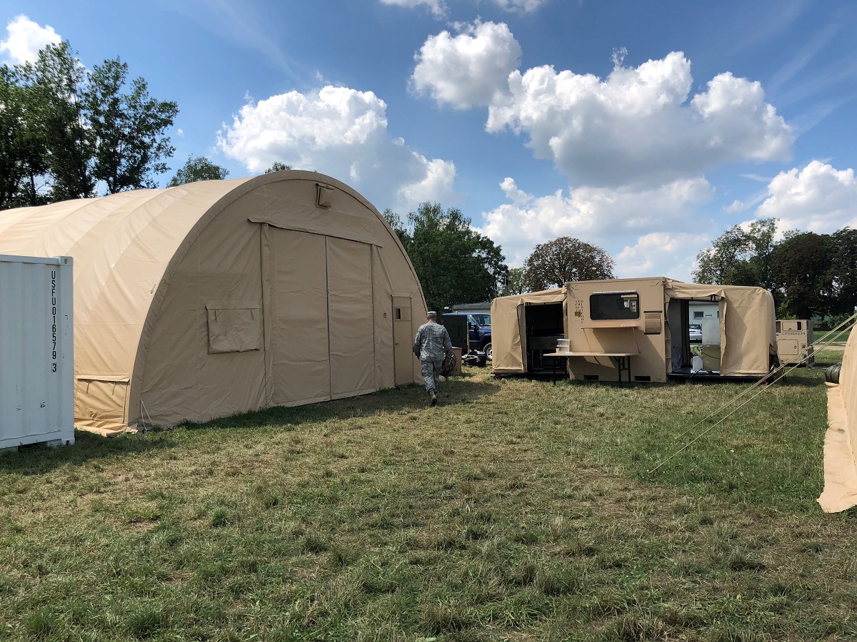 The dining facility, on left, with the camp's kitchen on right. During the DABS exercise, U.S. Air Force personnel ate breakfast and dinner with Polish forces, while airmen from the 200th RED HORSE Squadron DET 1, Ohio Air National Guard, cooked daily lunches. (Valerie Insinna/Staff)