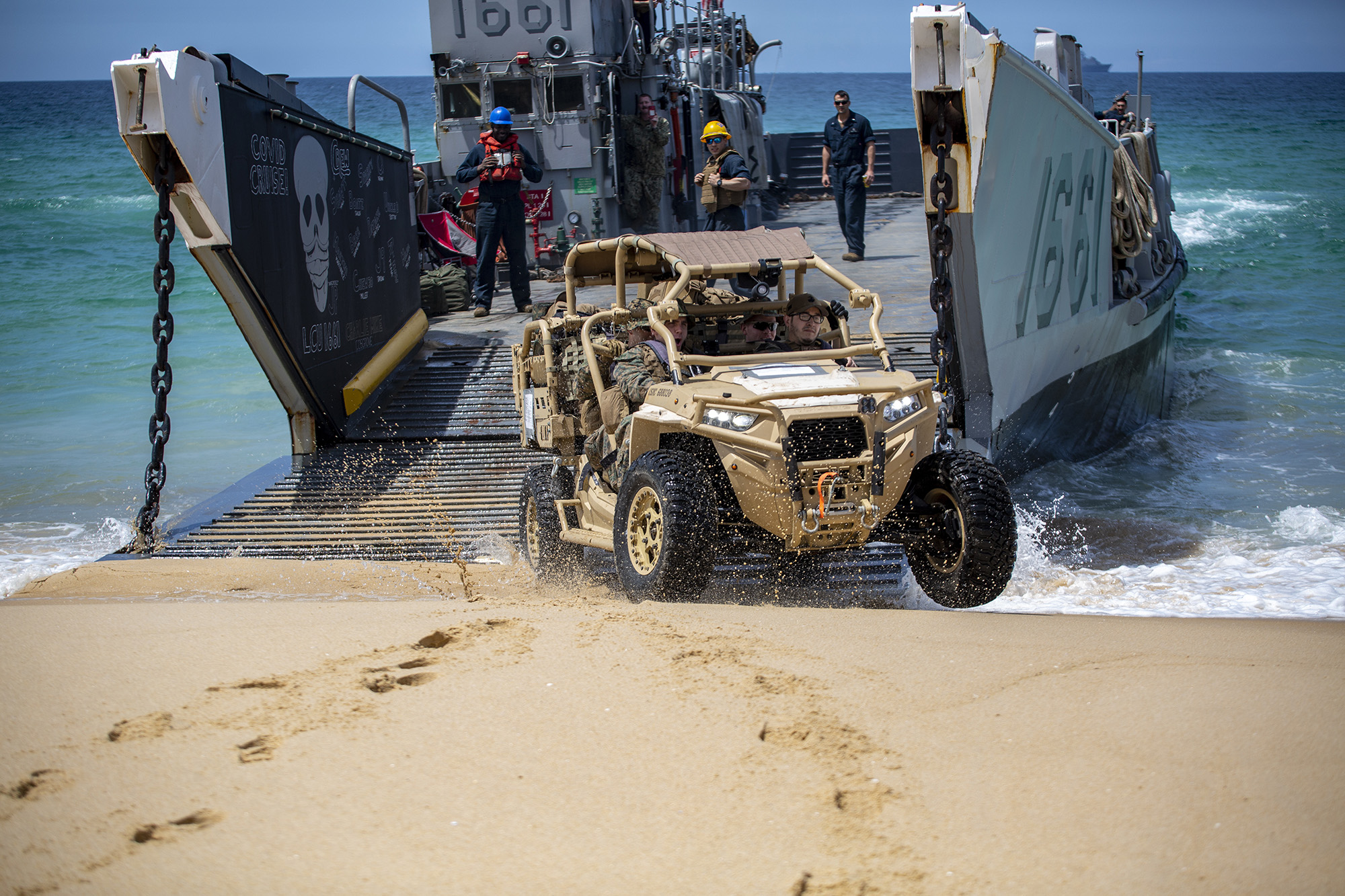 Landing Craft Utility (LCU) 1661 deploys a Utility Tactical Vehicle during CONTEX-PHIBEX, a bilateral amphibious exercise between the U.S. and Portuguese naval services, May 9, 2021, in Pinhiero Da Cruz, Portugal. (1st Lt. Mark Andries/Marine Corps)