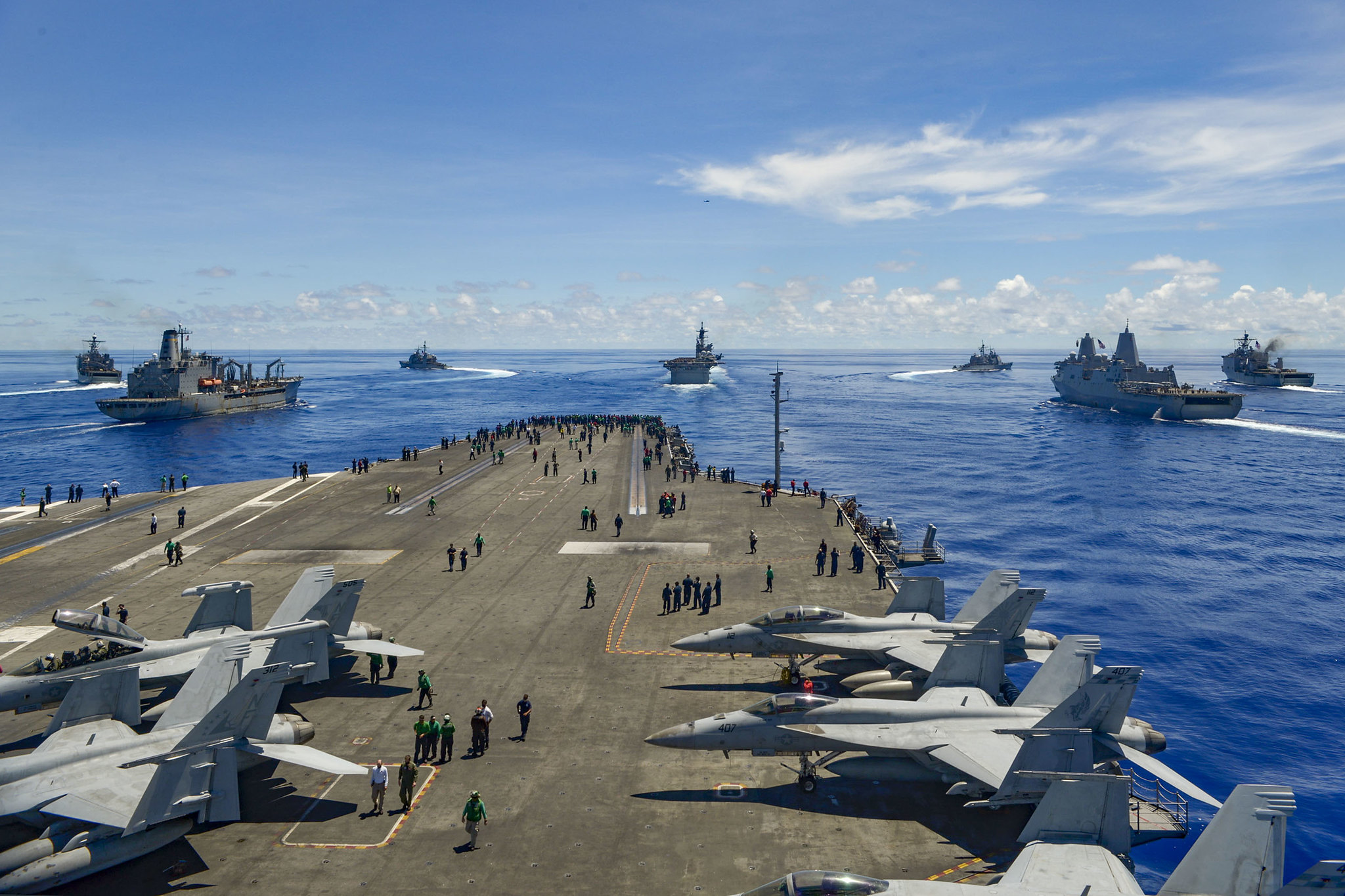 From left: USS Germantown (LSD 42), USNS John Ericsson (T-AO 194), USS Antietam (CG 54), USS Ronald Reagan (CVN 76), USS America (LHA 6), USS Shiloh (CG 67), USS New Orleans (LPD 18), and USS Comstock (LSD 45) break away from formation in support of Valiant Shield 2020 on Sept. 25, 2020, in the Philippine Sea. (Mass Communication Specialist Seaman Apprentice Oswald Felix Jr./Navy)