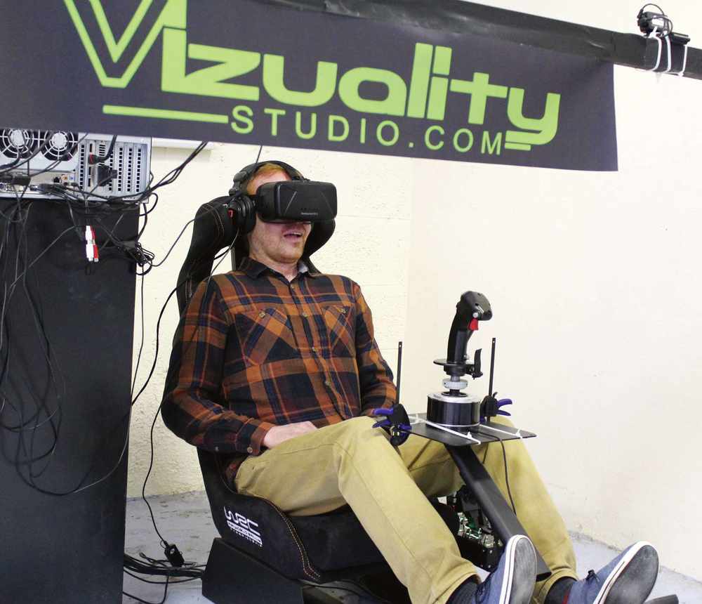 Tom Ogg immersed in a virtual world