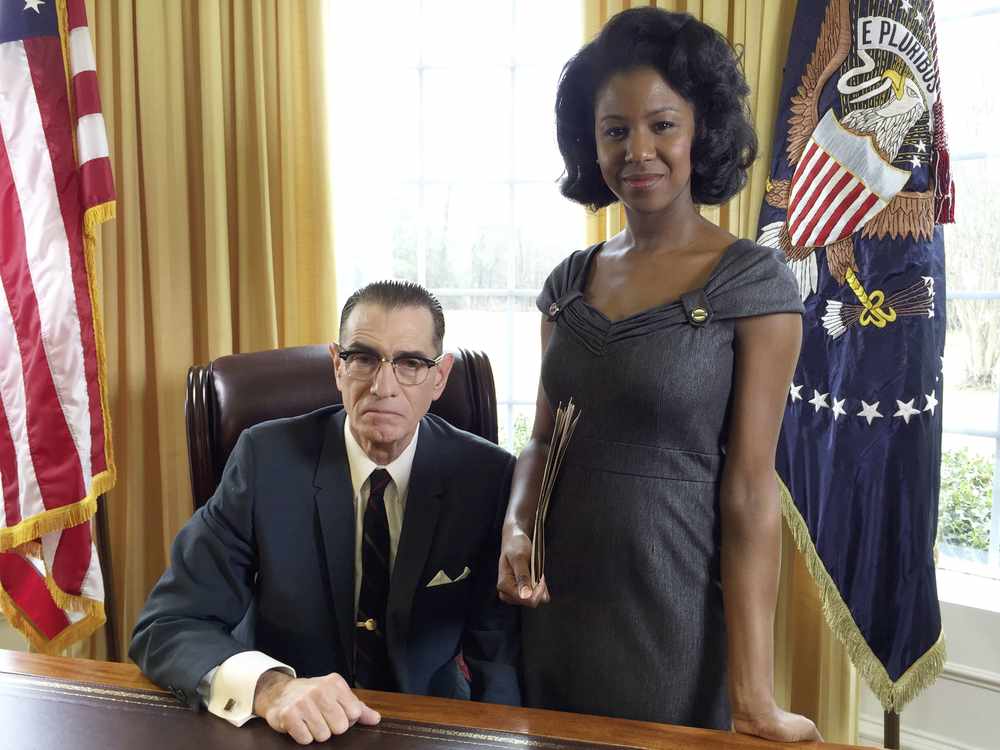 Actors Mark Murphey as President Lyndon B Johnson and Dené Hill as Geraldine Whittington, his secretary