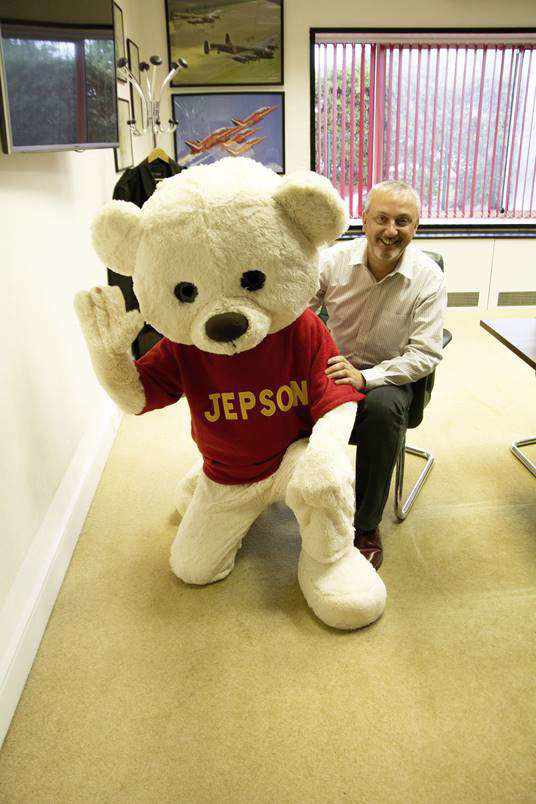 Managing director Paul Carter with JEP bear Jepson