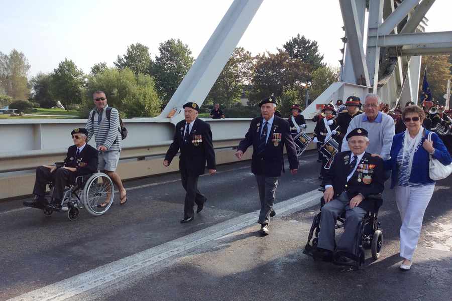 Island veterans march across Pegasus Bridge