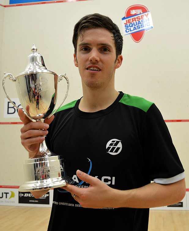 Guernsey's Chris Simpson with the impressive Jersey Squash Classic trophy. Picture: Steve Cubbins/www.squashsite.co.uk
