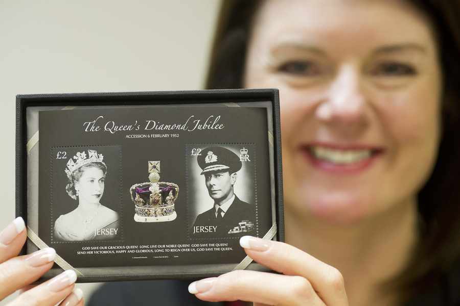 Sally Diamond Ferbrache, head of Philatelic at Jersey Post, with the Queen's Diamond Jubilee stamps and first day covers