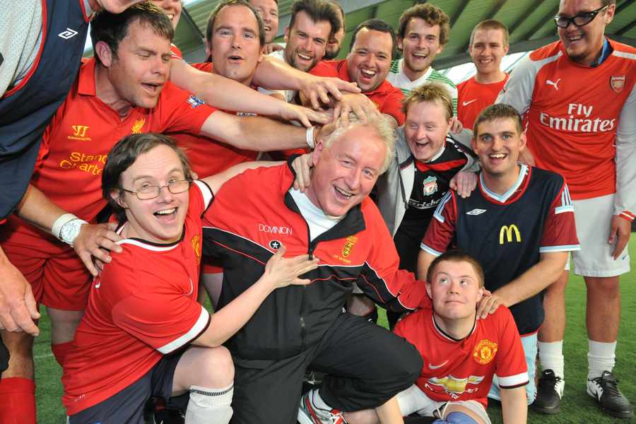 Mark Jones at Les Ormes with members of the Jersey Disability Football Team, which he helps to co-ordinate
