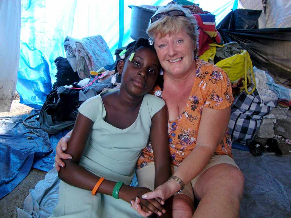 Sarah in Haiti in 2010, offering aid following the earthquake that devastated the country